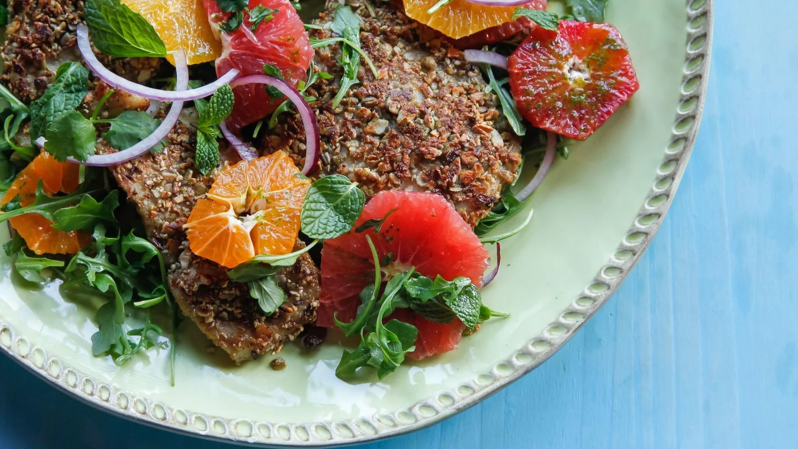 Pepita-Crusted Sea Bass With Coconut Chili Oil prepared by Isabel Cruz of Isabel's Cantina in Pacific Beach. (Eduardo Contreras U-T)