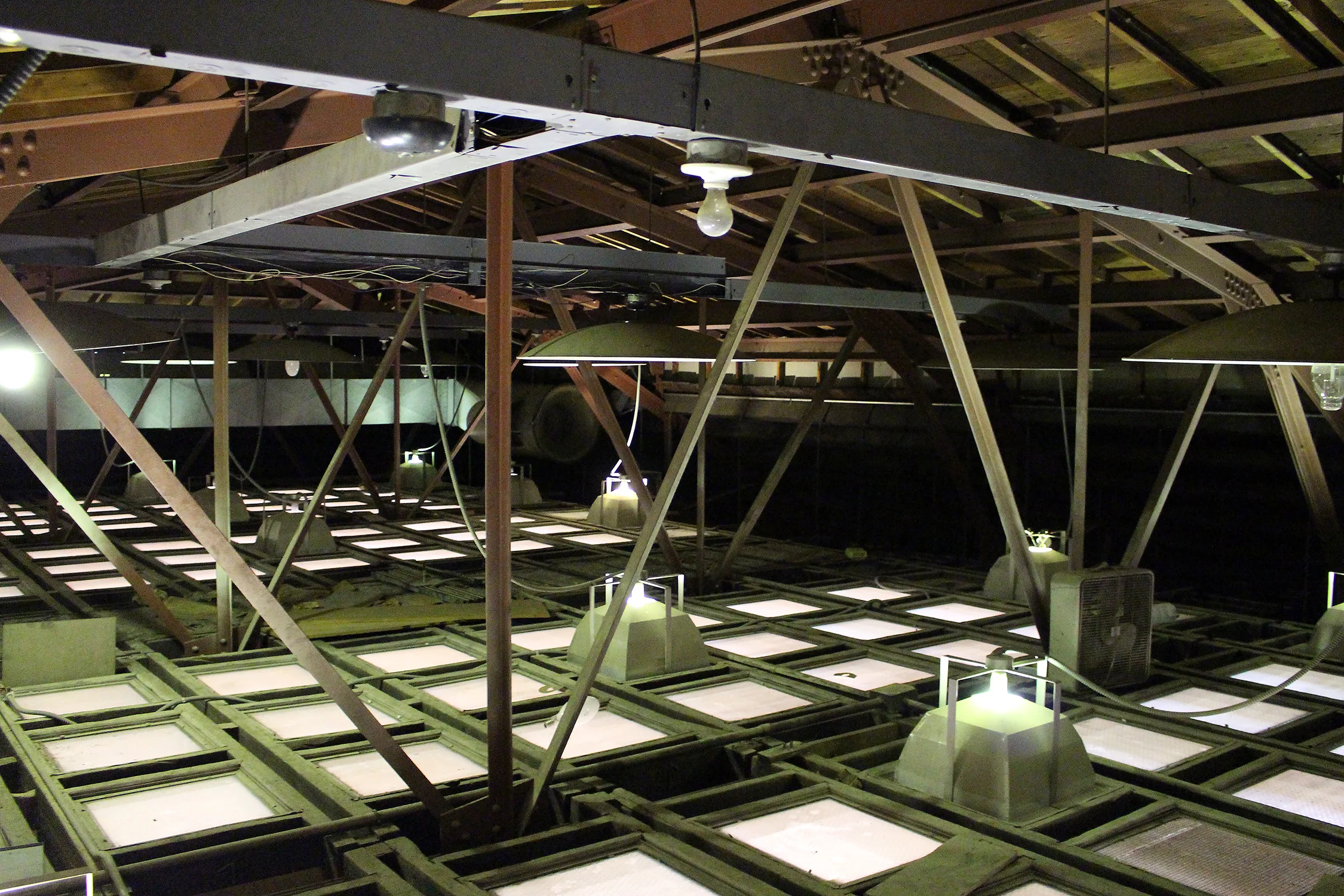 It wasn’t until we accessed the attic space through the roof that the coffered ceiling was discovered to be a full false skylight. Years of neglect and failed attempts at maintaining original and replacement technologies rendered the “skylight” useless.