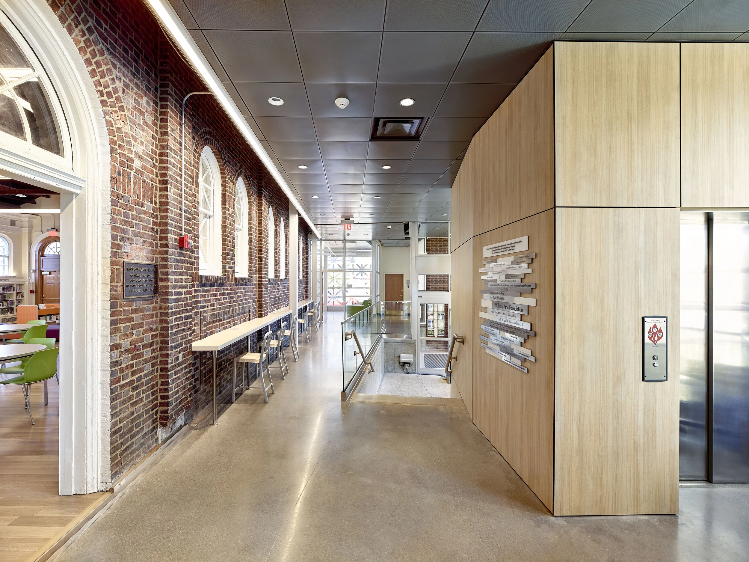 We carried the same linear pendant through the addition to tie the spaces together.