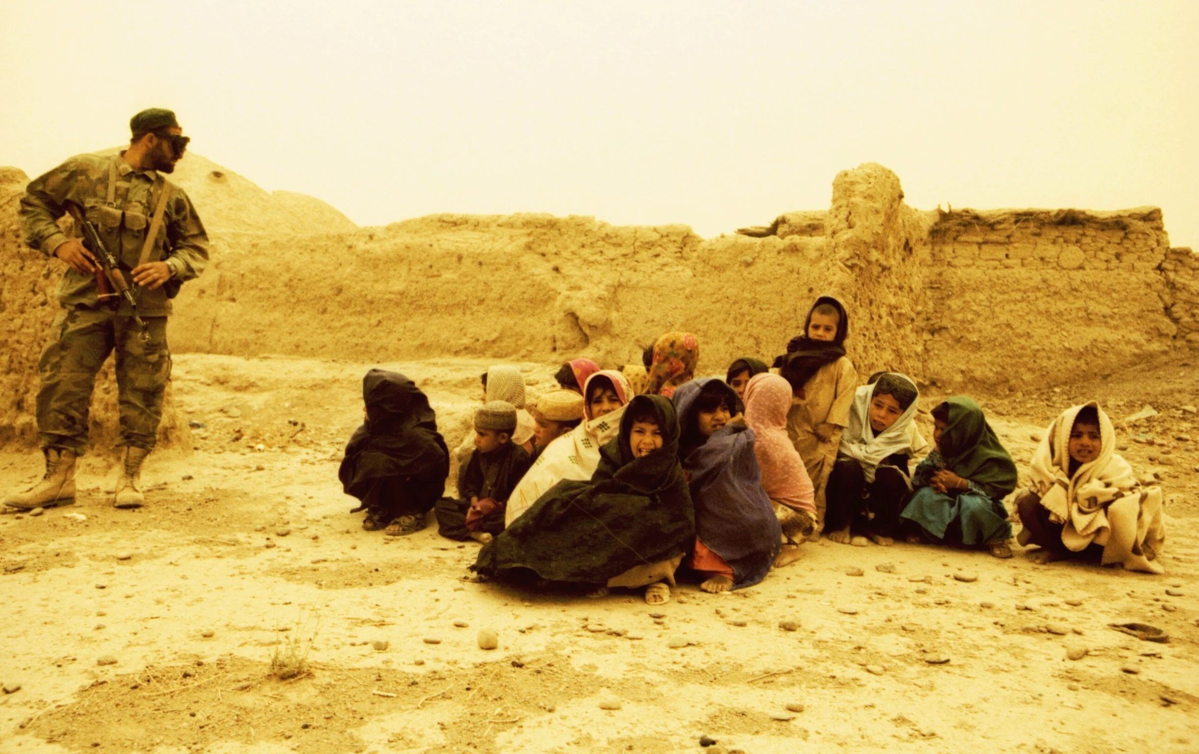 travel-the-road-afghanistan-soldier-children-ruins.jpg
