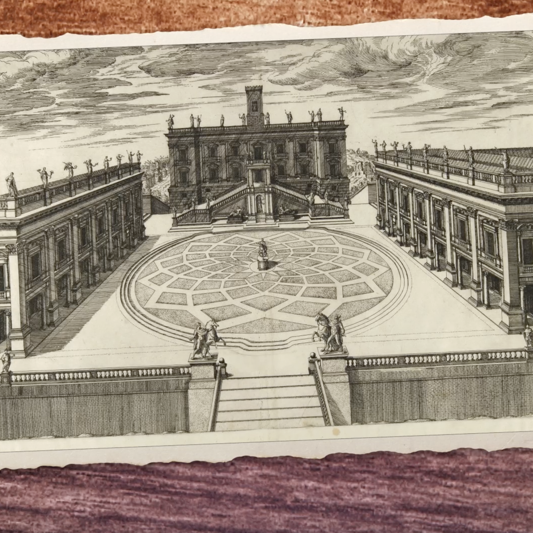 An architectural drawing of a grand courtyard with a central fountain, surrounded by two symmetrical buildings with detailed facades. There are statues on the railings and stairs, and a large building with stairs and statues atop it in the background