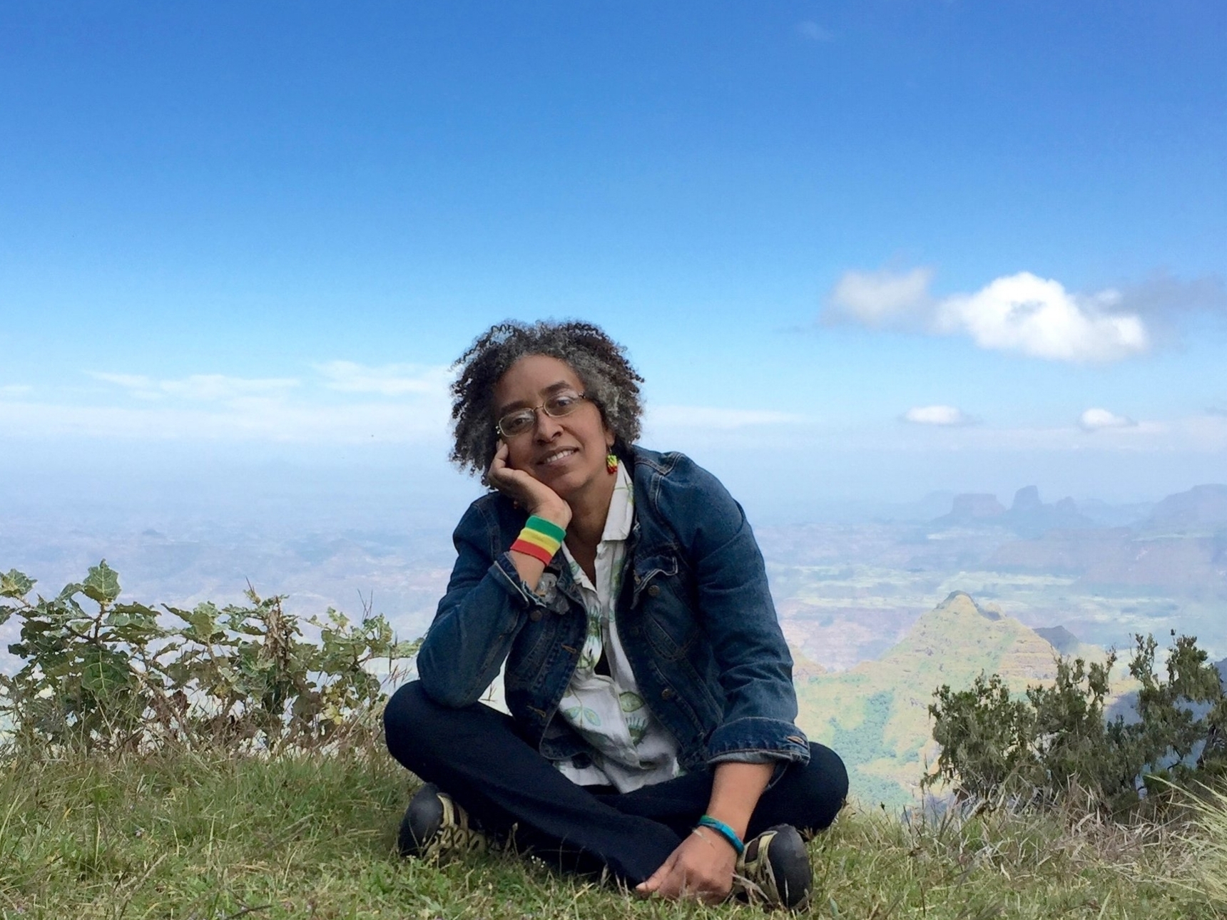After teaching in Ethiopia I traveled. Here, I am sitting on the edge of the Simien National Park in Ethiopia, Africa's Grand Canyon and the edge of the great Rift Valley, the cradle of civilization. Ethiopia is gorgeous, has many World Heritage sites, and the people are extremely compassionate and humane. You should definitely visit!
