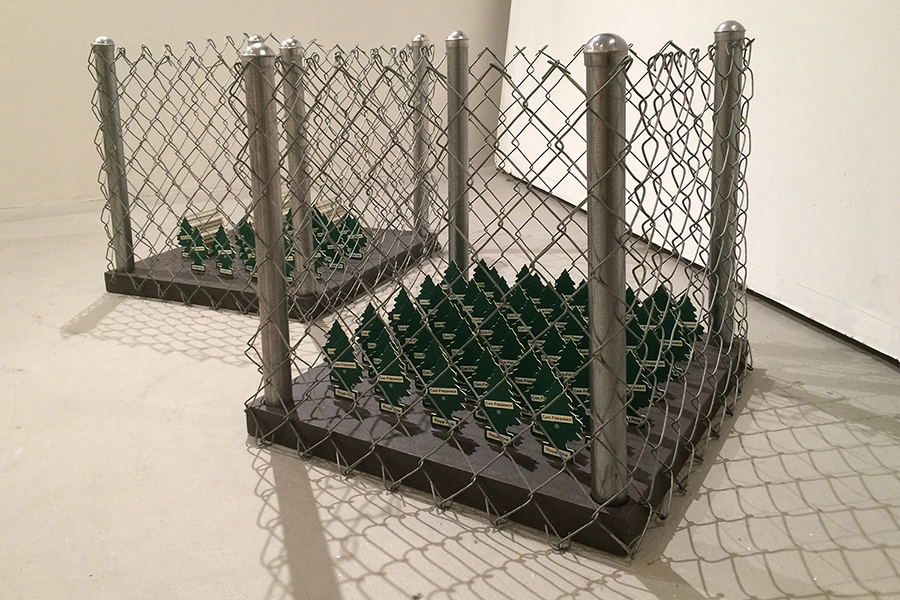 Exurban: Yard Cubes , 2015 Each is 2ft x 2ft x 2ft, Little Tree air fresheners, wood, paint, and metal