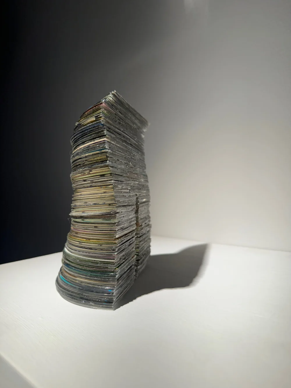   Half Life , 2024 Disc fragments and adhesive 