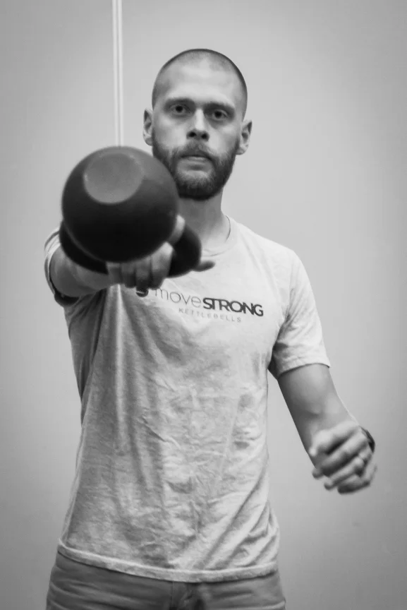 Dustin Jones, Doctor of Physical Therapy, CSCS, Strength and Movement coach, and pulled in by the kettlebell.