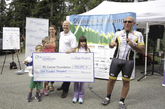 Geoff Glotman presenting a cheque for $400,000 to the BC Cancer Foundation on behalf of the Glotman Simpson Cycling Club. (Credit: Sorensen Parker Creative)