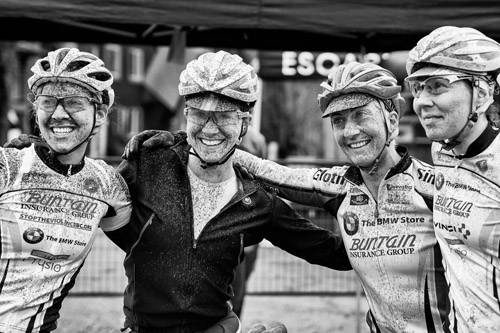 Smiles with the splatters of mud at a very fast, and dirty, EV Stage Race. Photo: Hung Mai Photography