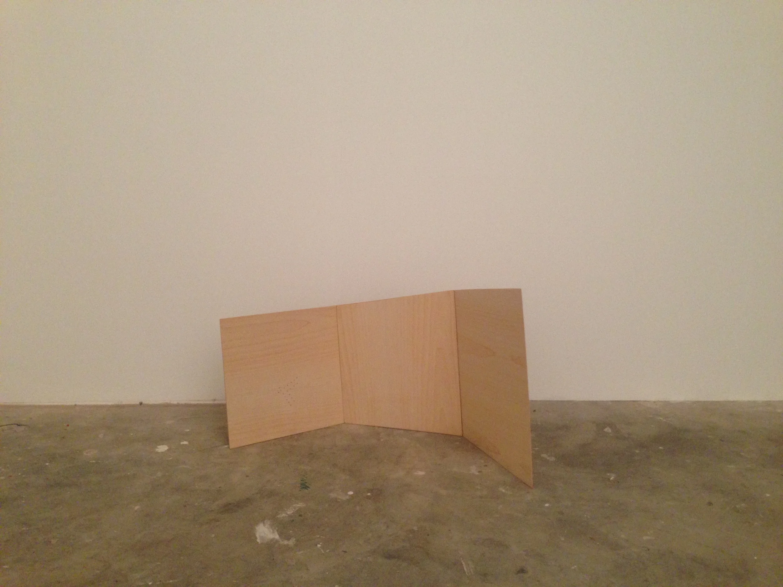 preparing to install Vanya Lambrecht Ward's folded birch veneer