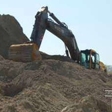 silver Select Composition: This is a perfect blend of excavated clay and sand. Mined from the water table, this virgin material has consistent moisture content, color and compaction. Our PI meets the strictest of specifications and stays consistent; it traditionally stays between 4-12. However, we can custom mix it for your job. We excavate our Silver Select with hydraulic excavators after being ripped and broken up with our Cat D8T Bulldozer. We then load with our Cat 980 Front End Loader. We also load with our Hitachi 450 Excavators during high volumes. We are more than capable of handling the most demanding projects, large or small. Applications: Our Silver Select is ideal for building foundations, back filling retaining walls and home pad sites. $5.00 Per Cubic Yard
