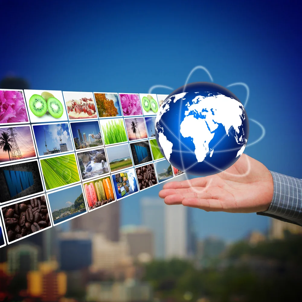 media screens with hand.jpg