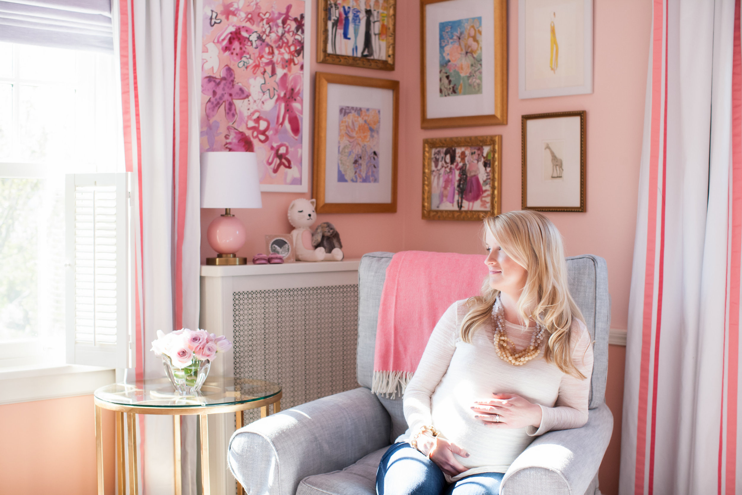 Sitting in Baby N's nursery - I chose to decorate her walls with art I've collected over the years (mostly from our time in NYC), as well as some original fashion illustrations I sketched live at New York Fashion Week. As she gets older, I hope to replace with her own art!
