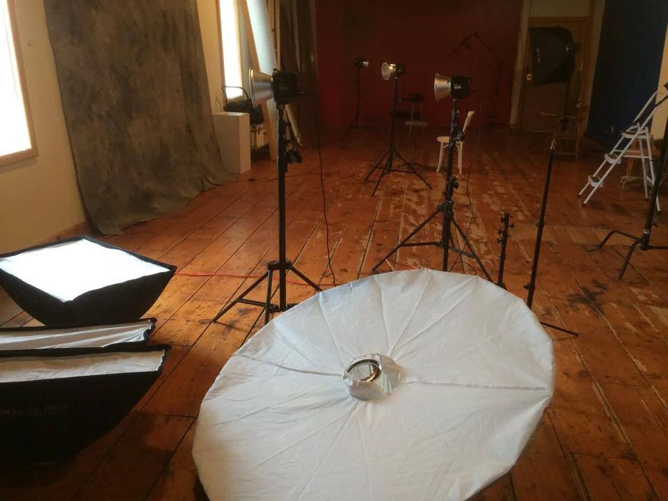 Lights, backdrops, and cameras come to play together at the Focal Flame Photography studio. 