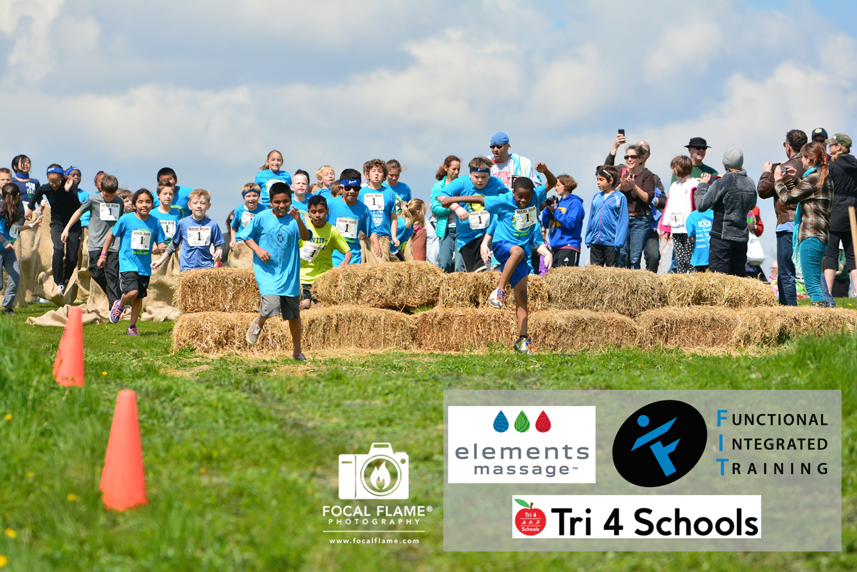Hundreds of kids - and their families - participate in the Tri 4 Schools Mud Run. © 2014 Focal Flame Photography | Photo credit: Jacob Ennis
