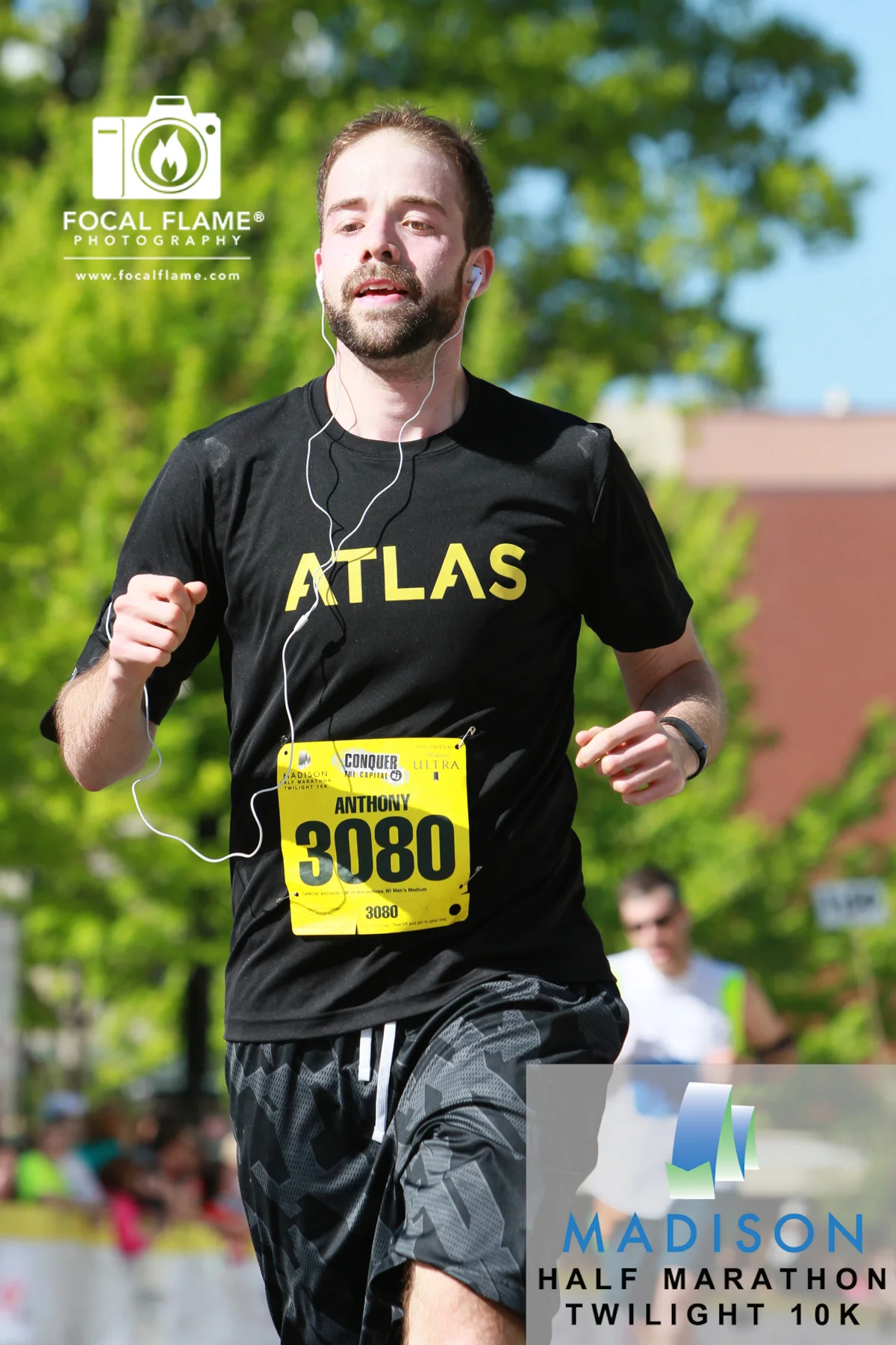 A mere twelve hours later, Garcia raced the Madison Half Marathon, finishing strong under a warm early summer sky. © 2014 Focal Flame Photography | Photo credit: Edward Esmao