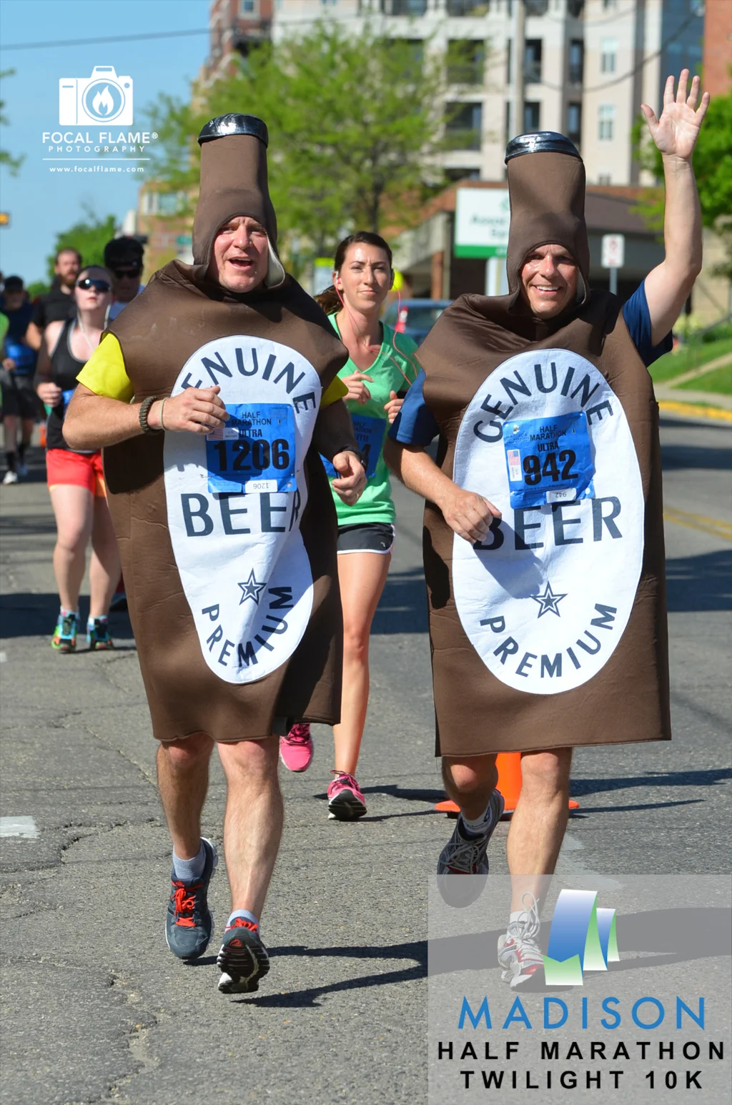 Mich and Ultra, otherwise known as Bill Enright (left) and Brent Kimbel (right), wave to fans during the 2014 Spring Madison Half Marathon. © 2014 Focal Flame Photography