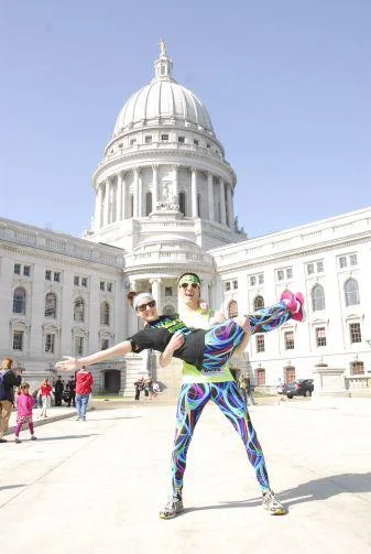 Cara and her brother and training partner - who is also her groomsman - show their spirit in front of the state capitol building. Photo courtesy of Christine Conway. 