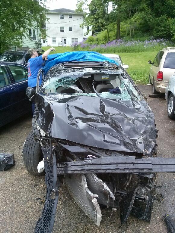 The seriousness of Stephanie's vehicular collision is apparent. This is her vehicle. Photo credit: Dale Sprague