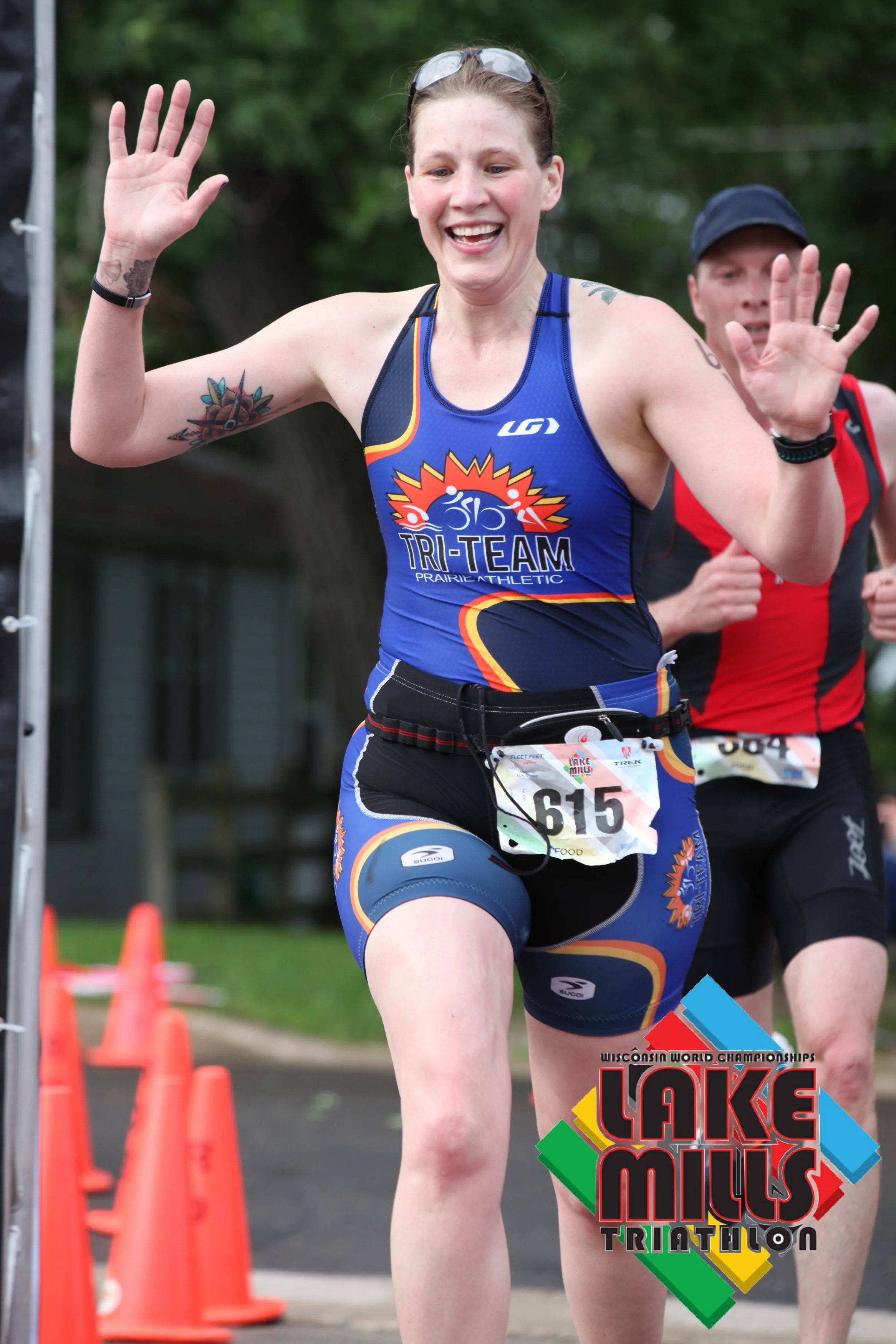 Brianne finishes strong at the Lake Mills Triathlon. (c) 2015 Focal Flame Photography | Photo credit: Ed Esmao on behalf of Focal Flame Photography