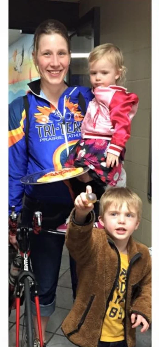 Brianne with her kids after completing an indoor triathlon. Photo courtesy of Brianne Pitts.