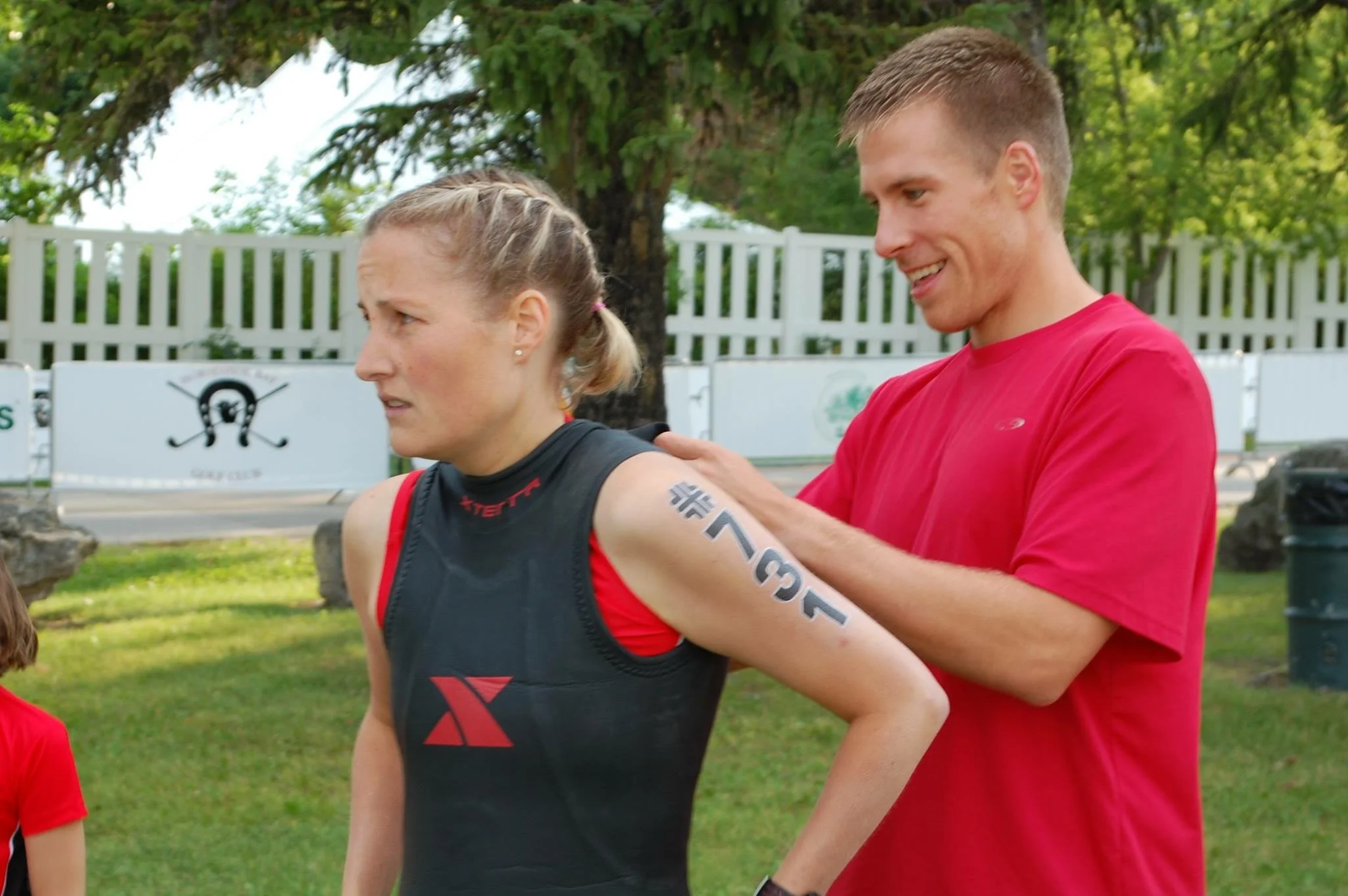 Krista getting pre-race assistance from her husband. Photo courtesy of Krista Willing.