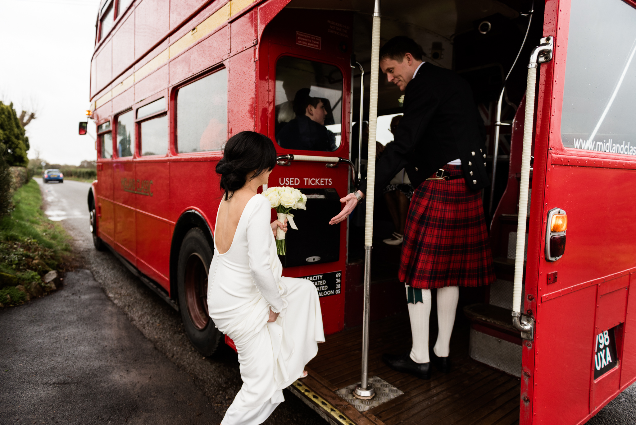 English Winter Wedding Photography at Somerford Hall, Staffordshire Red Bus Double Decker Kilts Bagpiper-36.jpg