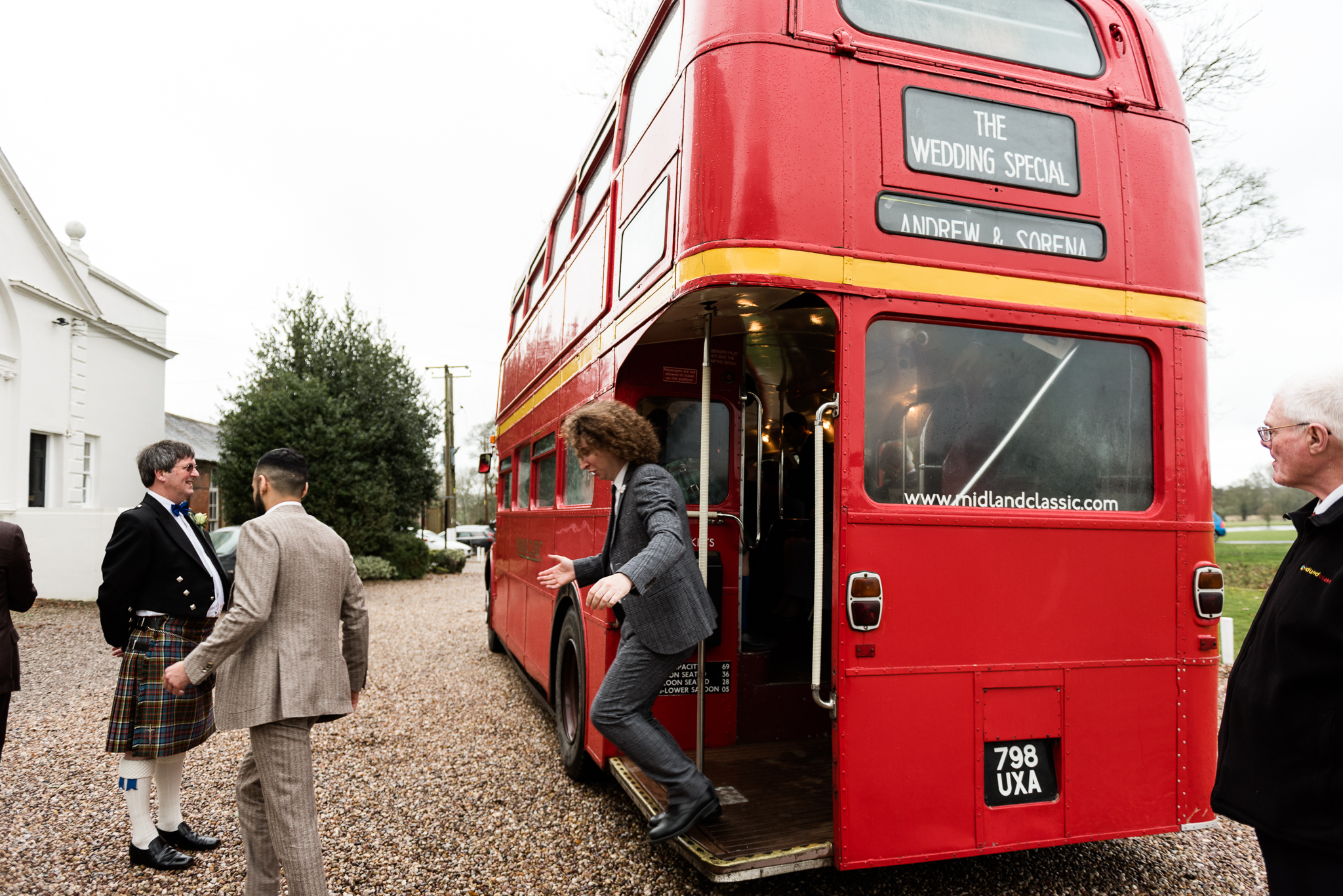 English Winter Wedding Photography at Somerford Hall, Staffordshire Red Bus Double Decker Kilts Bagpiper-38.jpg