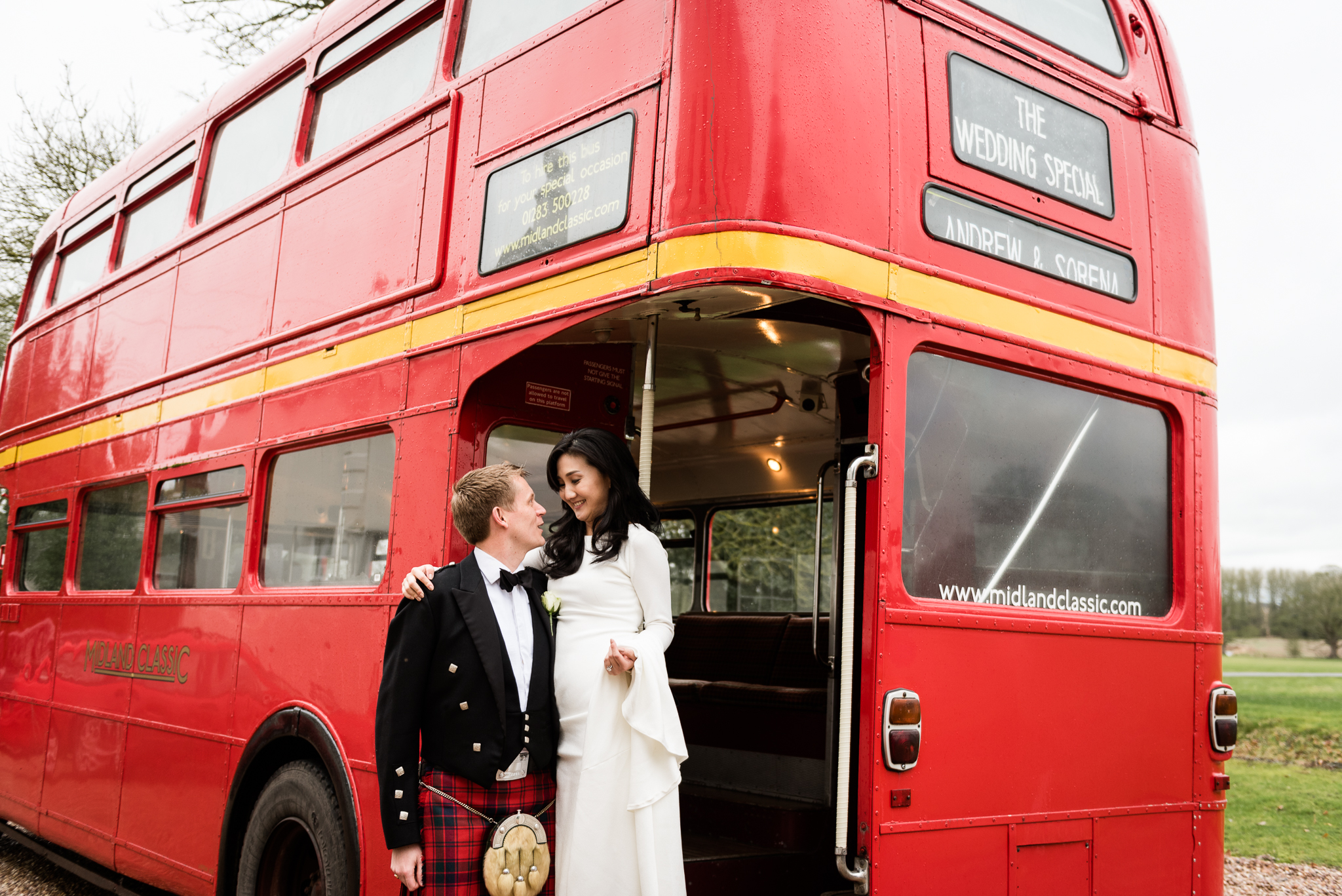 English Winter Wedding Photography at Somerford Hall, Staffordshire Red Bus Double Decker Kilts Bagpiper-41.jpg