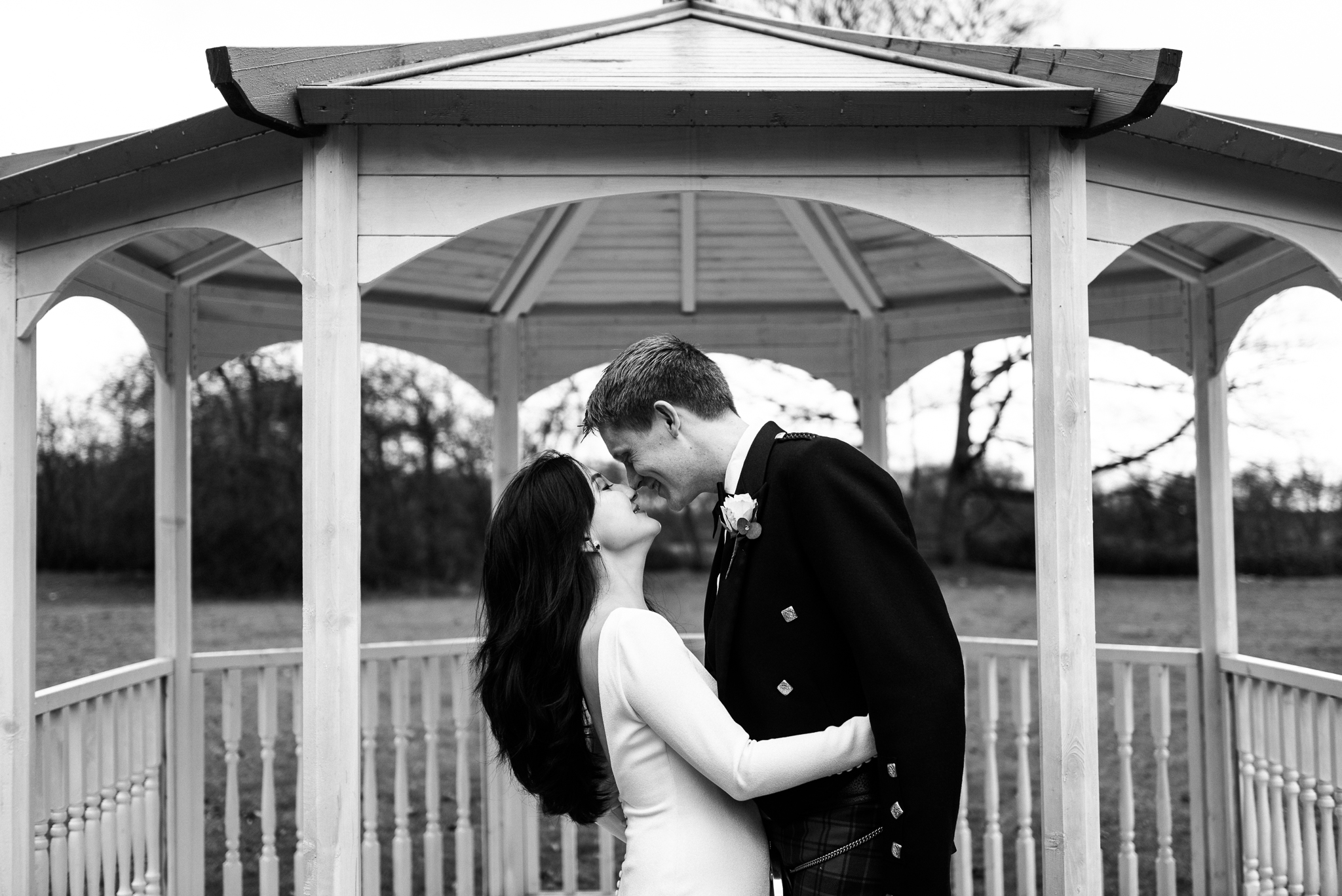 English Winter Wedding Photography at Somerford Hall, Staffordshire Red Bus Double Decker Kilts Bagpiper-45.jpg