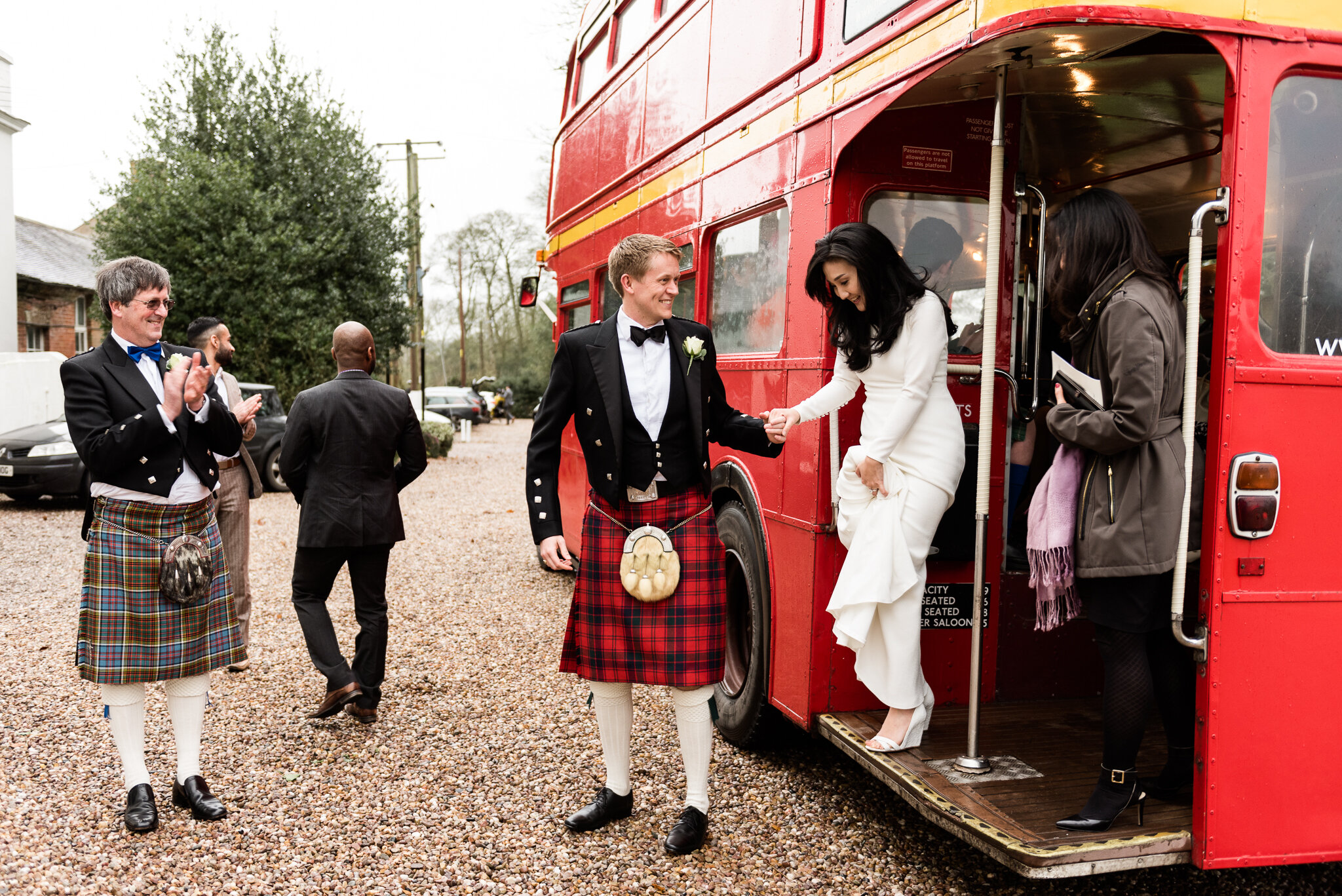 English Winter Wedding Photography at Somerford Hall, Staffordshire Red Bus Double Decker Kilts Bagpiper-39.jpg