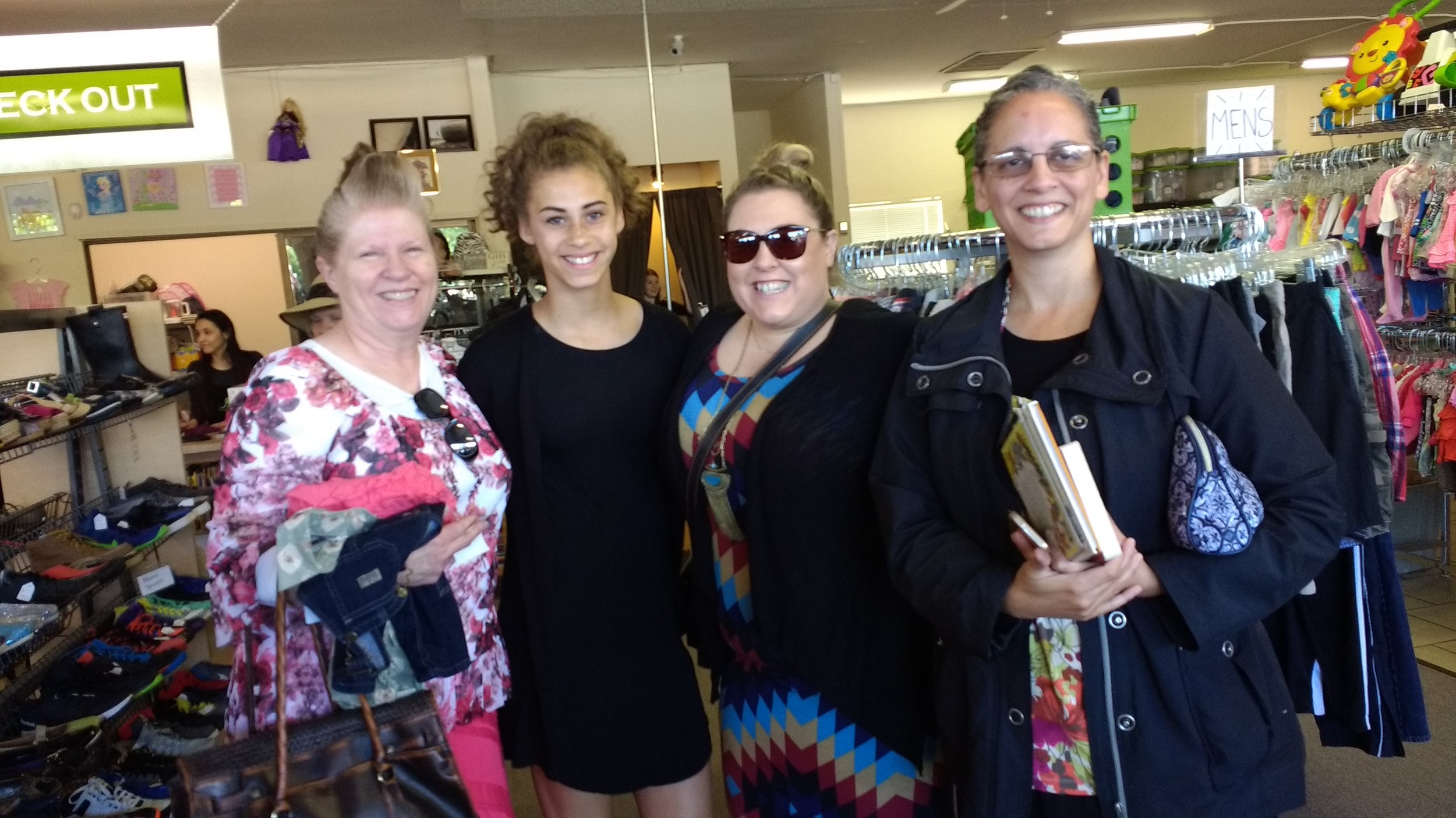 Sis. Green, granddaughter Mira, daughter Cari and Sis. Loretta at That Baby Store