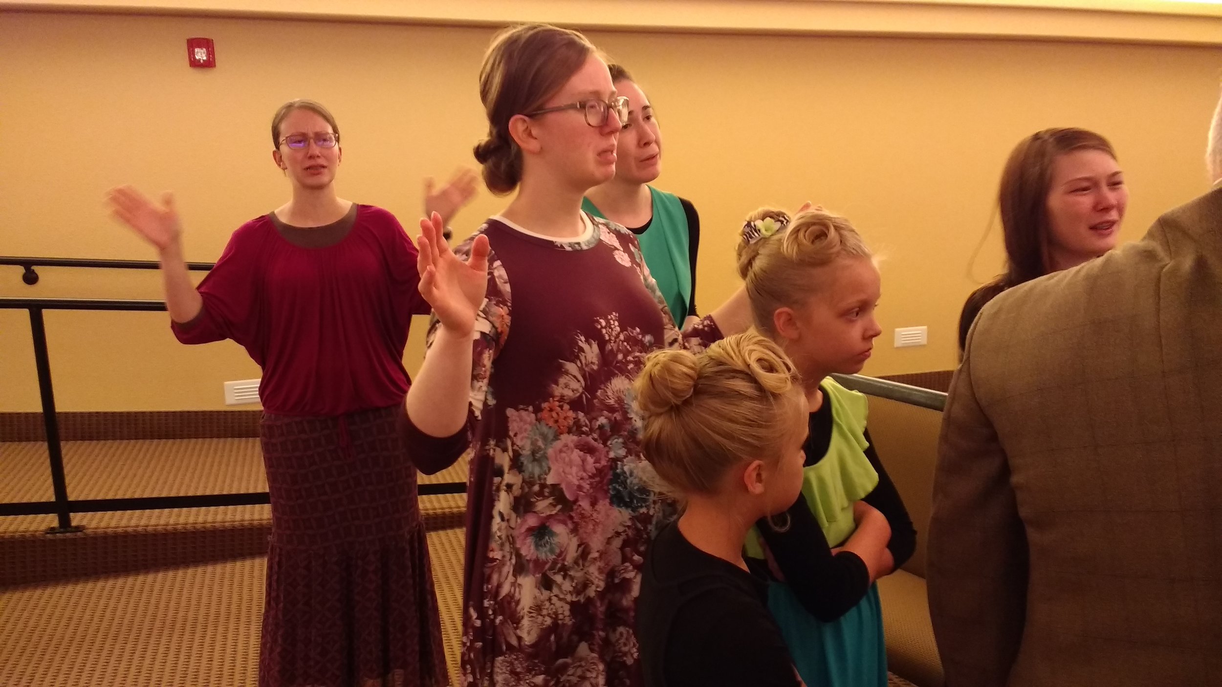 Praying with those at the altar