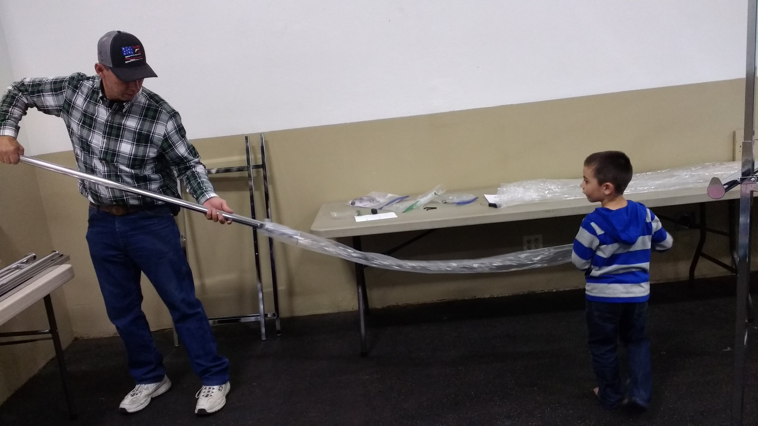 Bro. Mick and grandson Jared setting up our vendors area