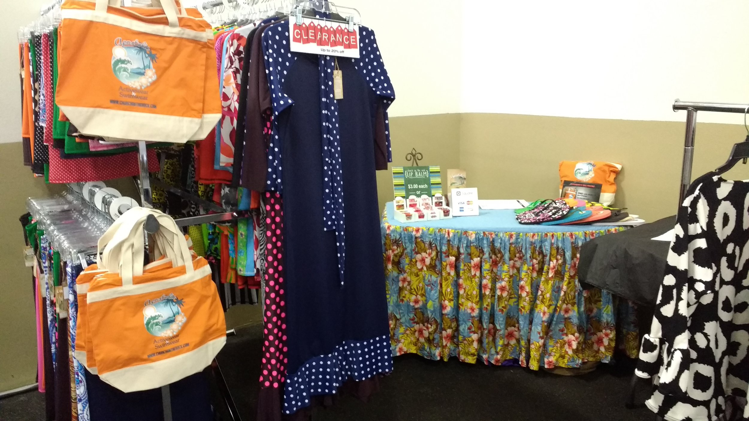 Apostolic Bathing Suits, beach bags, booth area