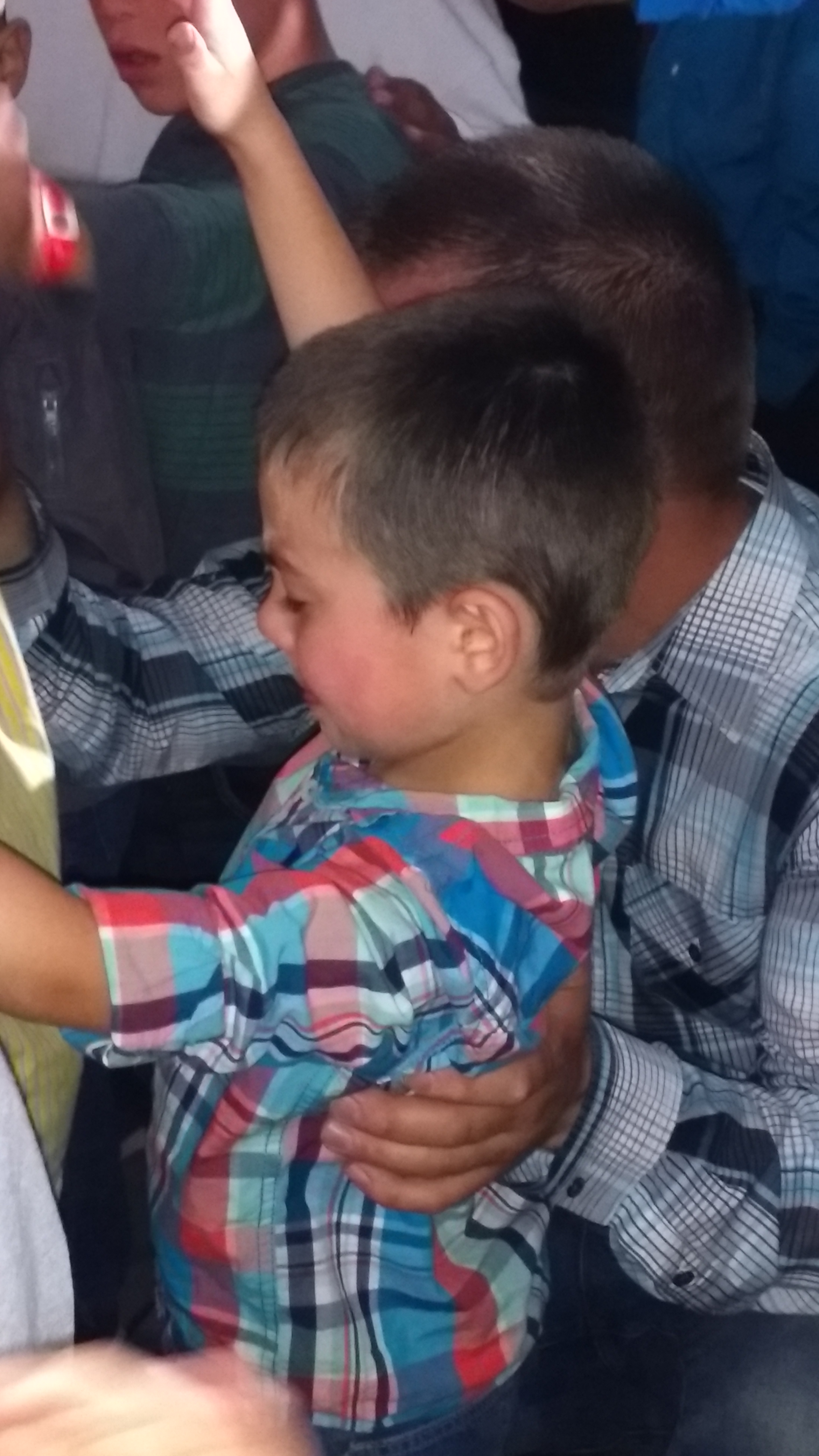 Bro. Matthew praying with Jared in children's church