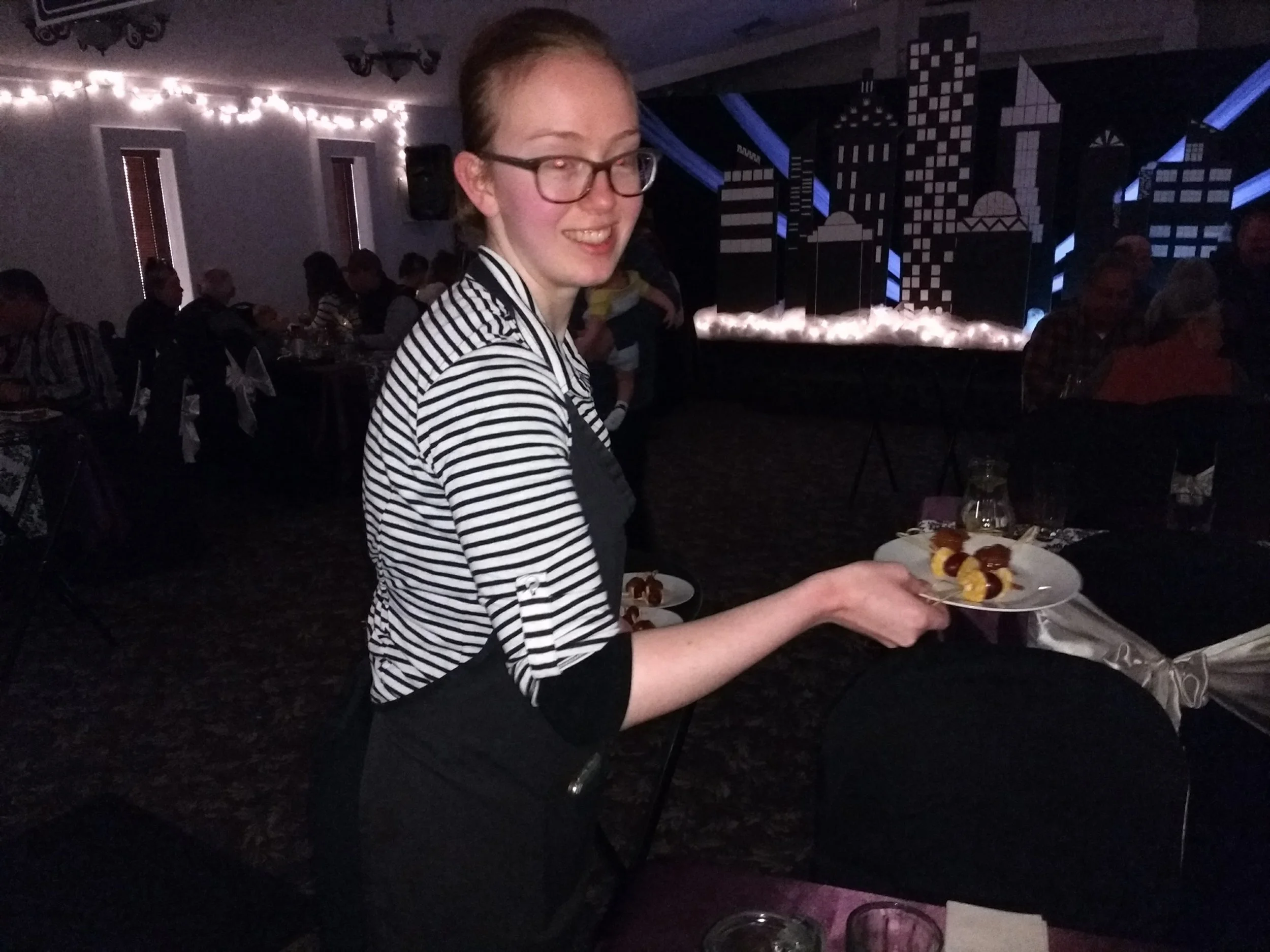 Sis. Sarah serving appetizers