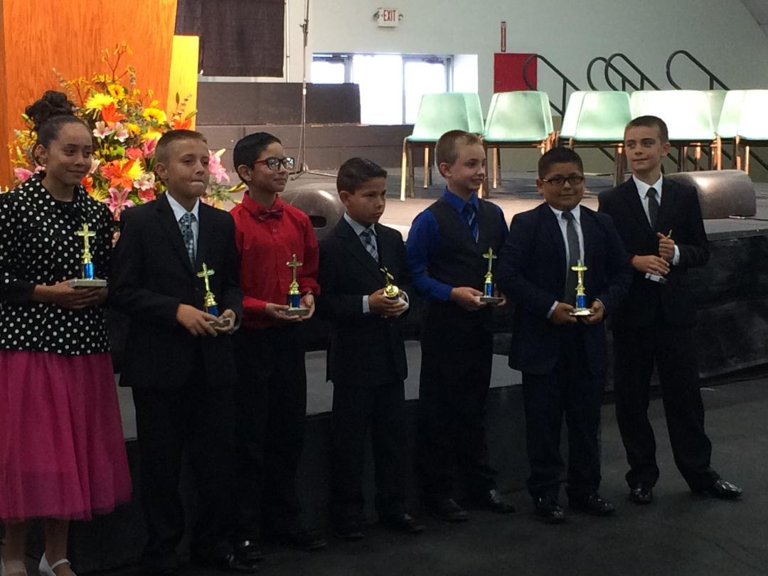 Dallas Hunt and the rest of his team winning trophies