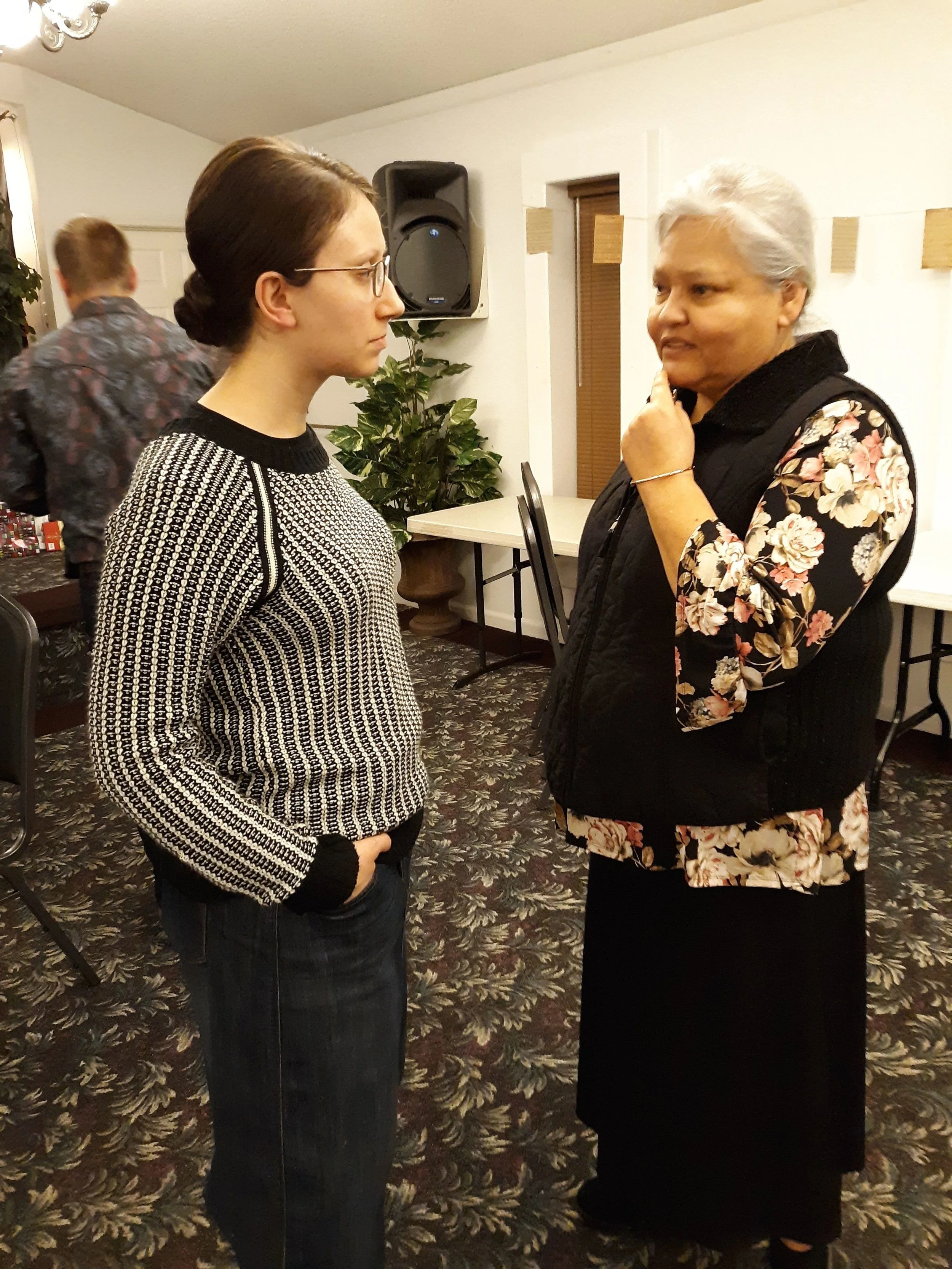 Sis. Jen and Sis. Nevarez in what looks like a very serious conversation