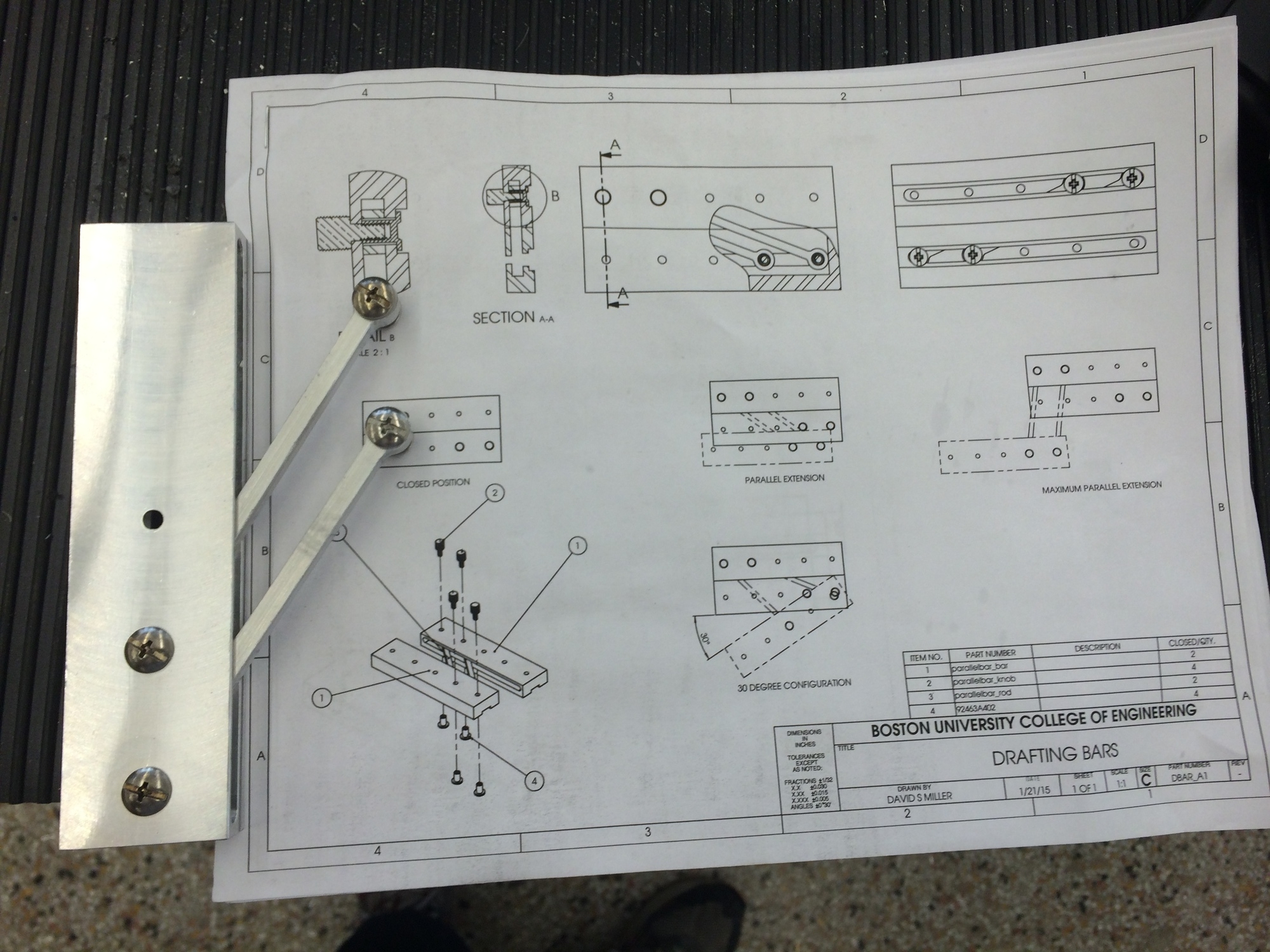  After milling the first bar, I put the rods and binding posts in. Starting to look like the drawing! 