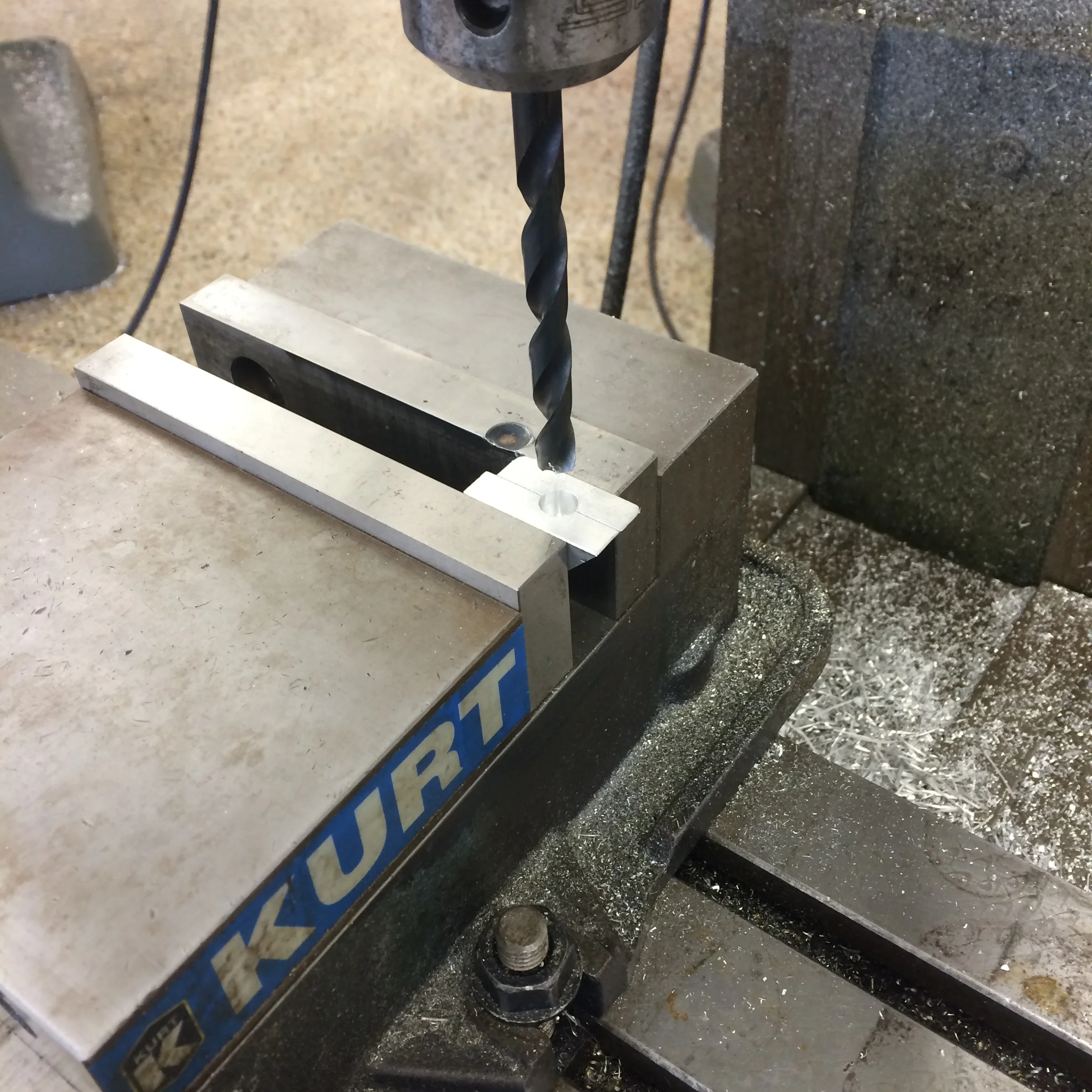 Testing the drilling of the semicircular features.