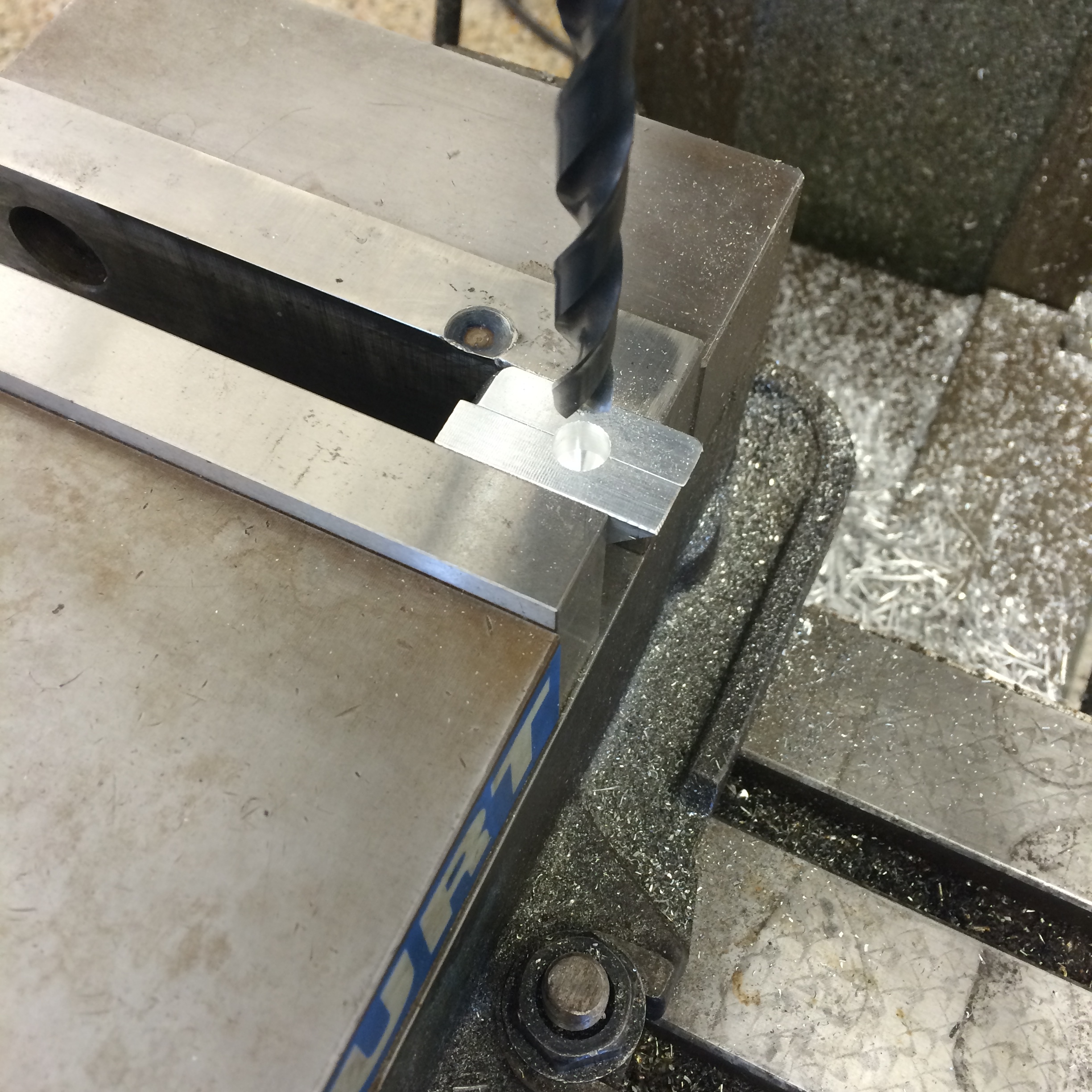  Drilling undersize for the reamer. 