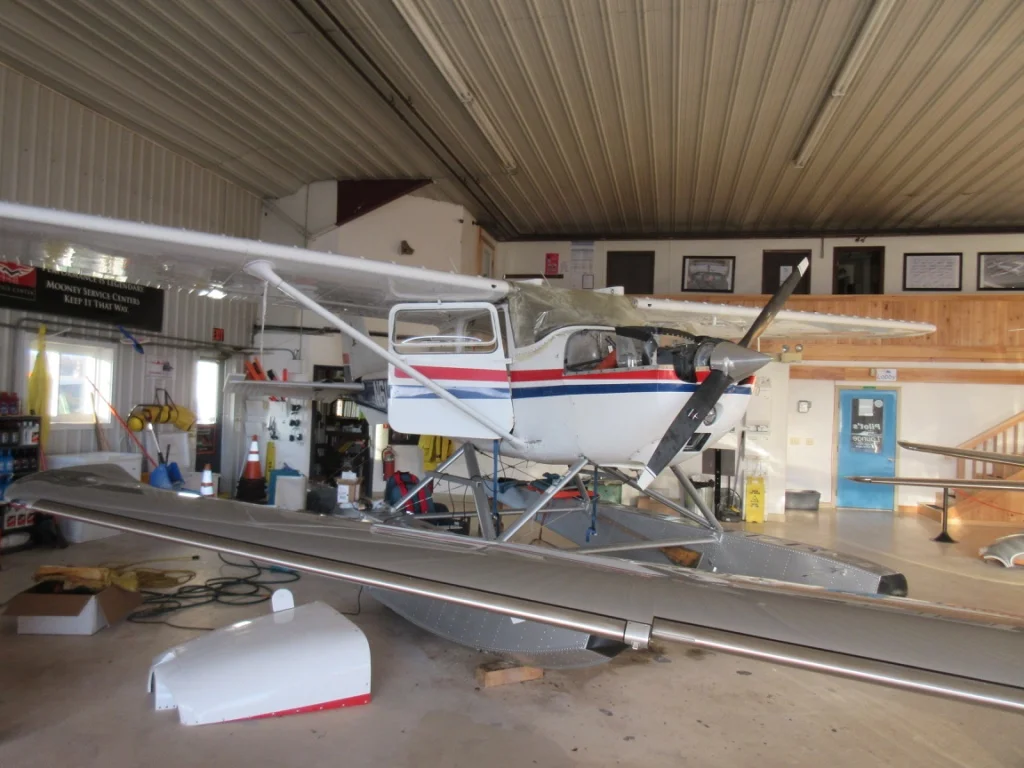 A C172 Classic on floats being repaired/restored at KBHB
