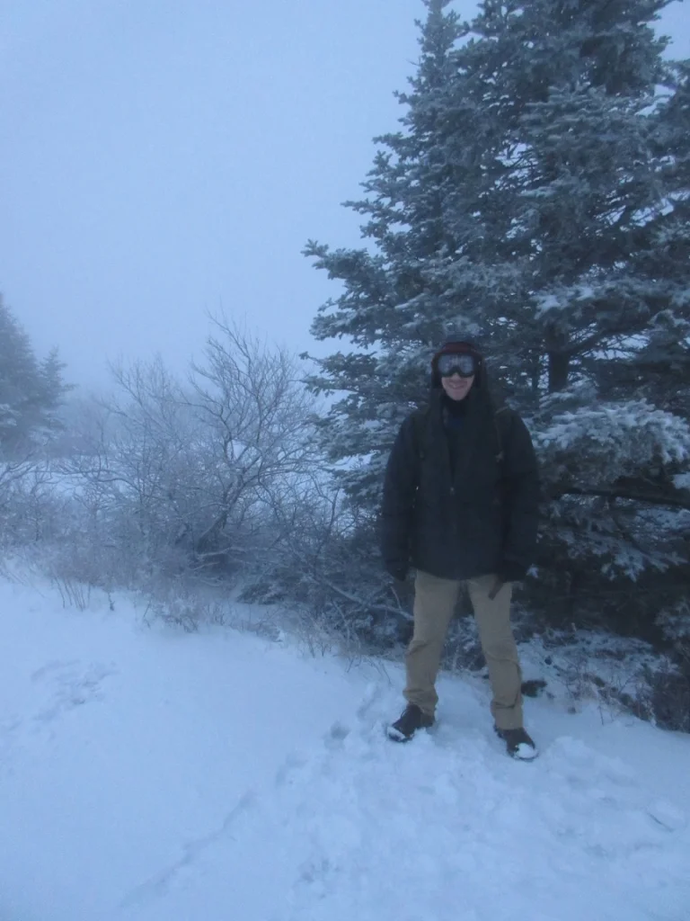 At the summit of Cadillac Mountain. There was not much to see due to the front passing through at the time. 