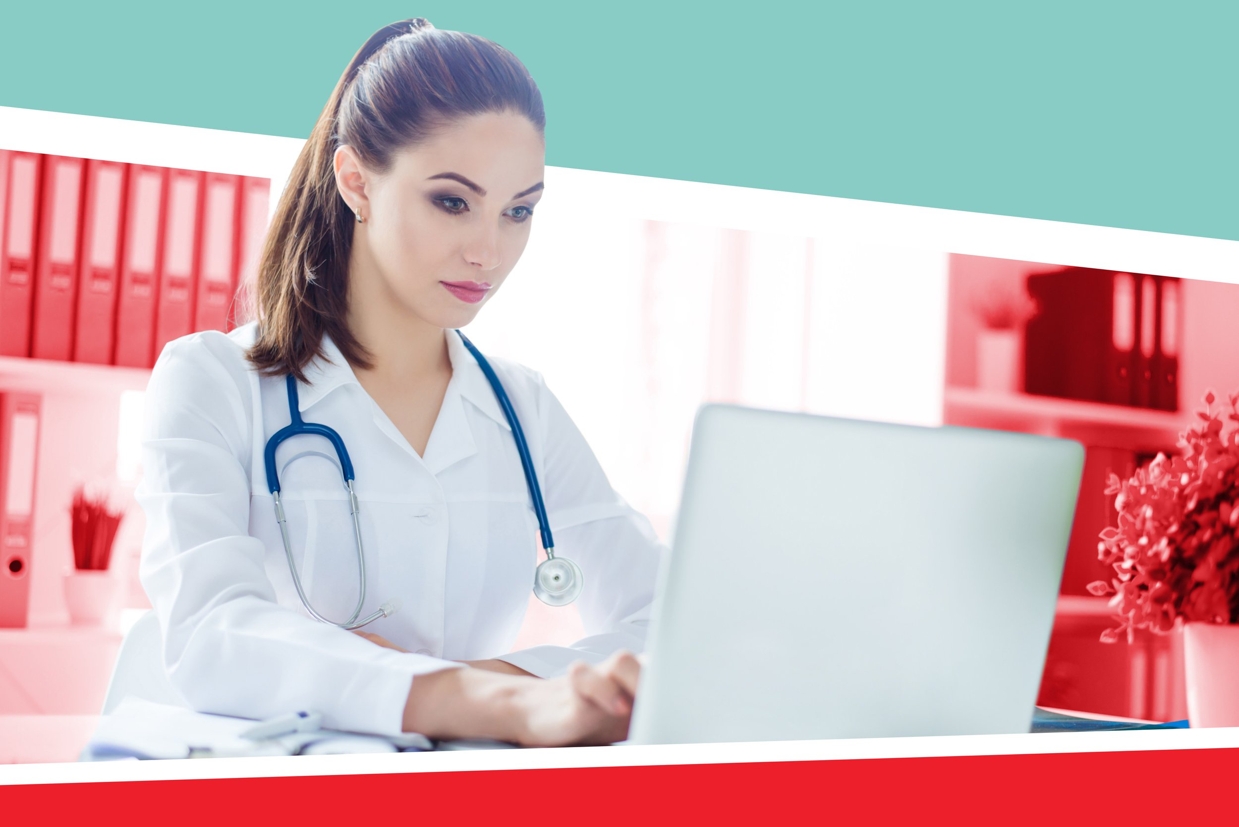 A medical school student wearing a white coat and working on her residency personal statement at a computer