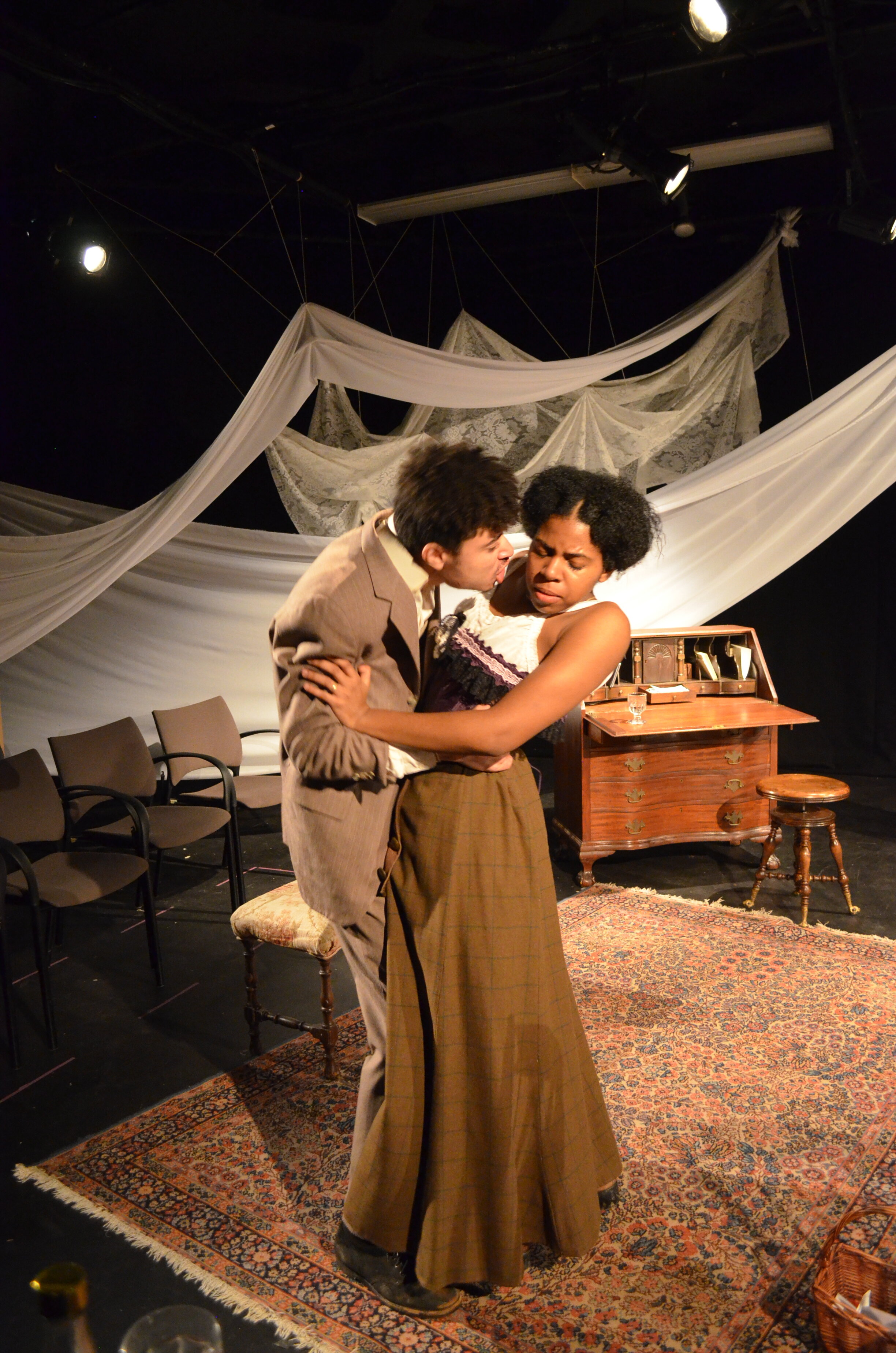  Miles Jordan as George Armstrong and  Dani Palmer  as Esther Mills in INTIMATE APPAREL, directed by Avital Shira.  Photo by  Stephanie Lynn Yackovetsky . 