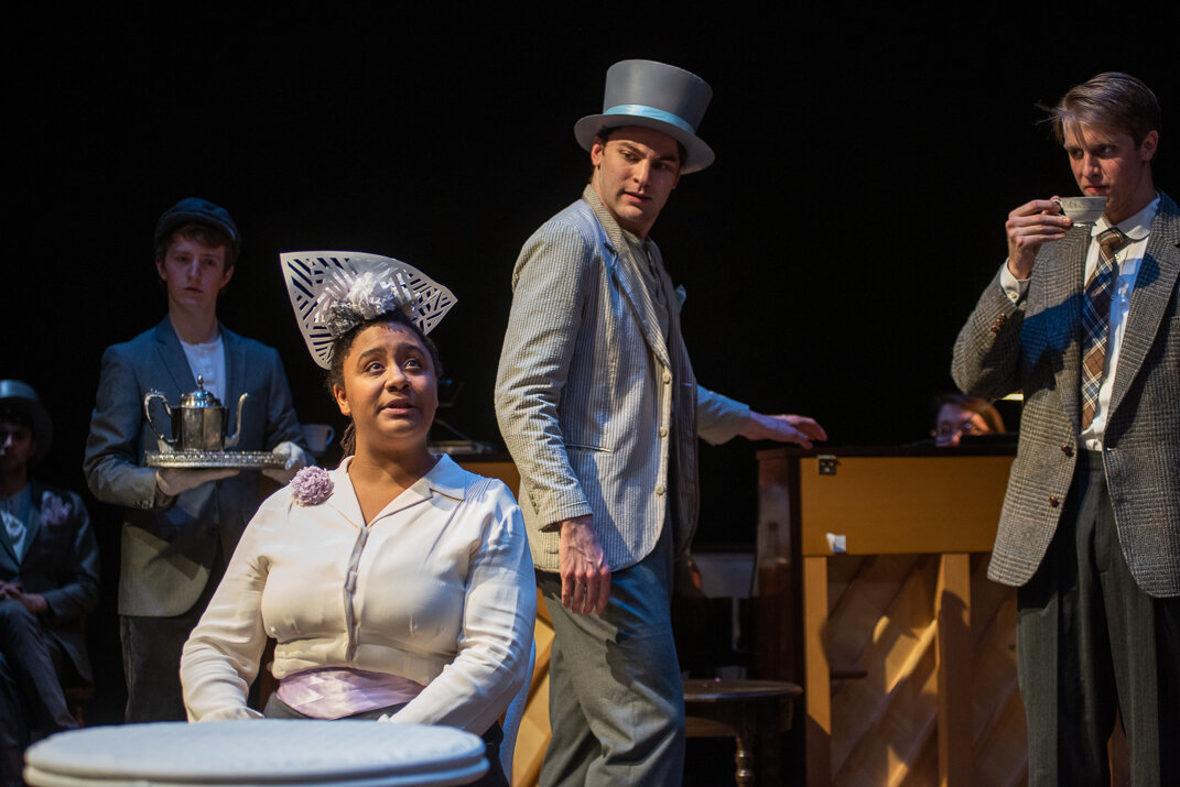  Zach Kelley, Khadija Bangoura as Eliza Doolittle, Max Corney as Freddy Einsford-Hill, and Peter Walsh as Henry Higgins in MY FAIR LADY, directed by Avital Shira. Photo by Andrew Brilliant. 
