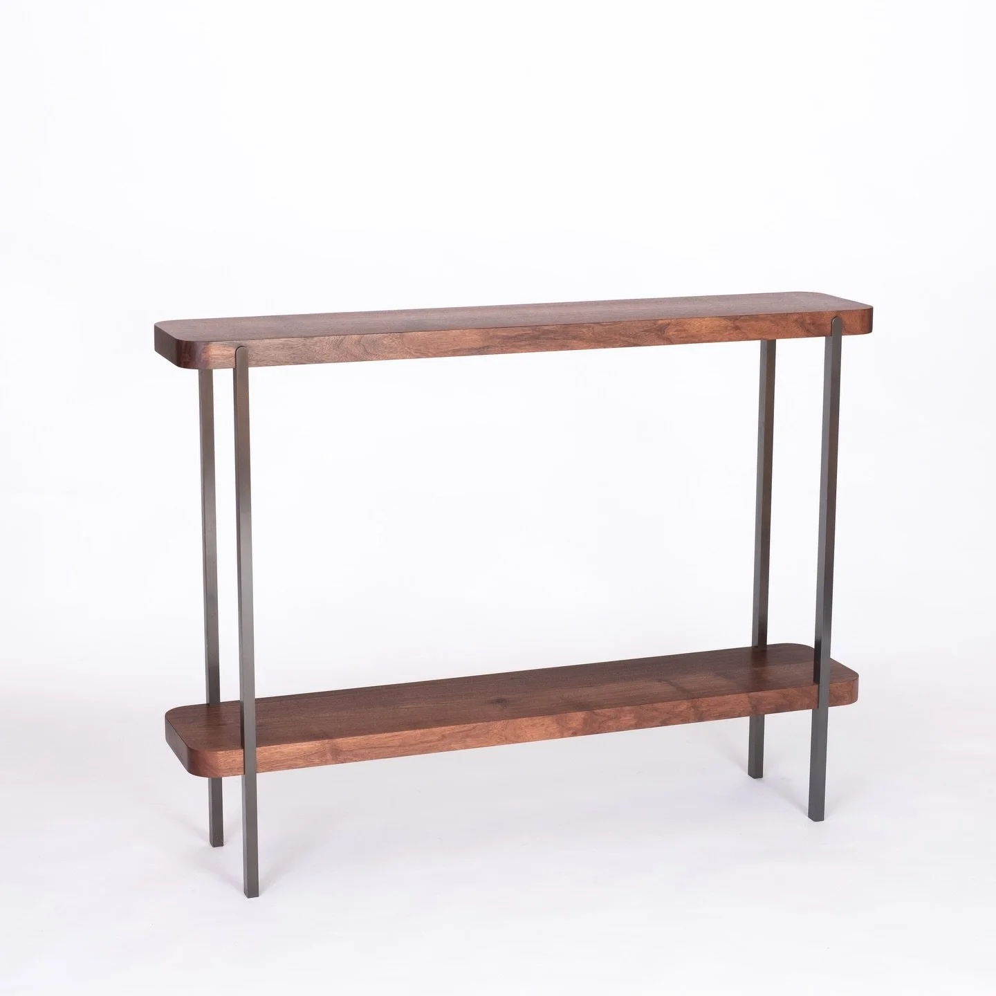 Union High Console table in western walnut and oil rubbed bronze legs. 

Find this on view at @_elevenla_ showroom in LA
