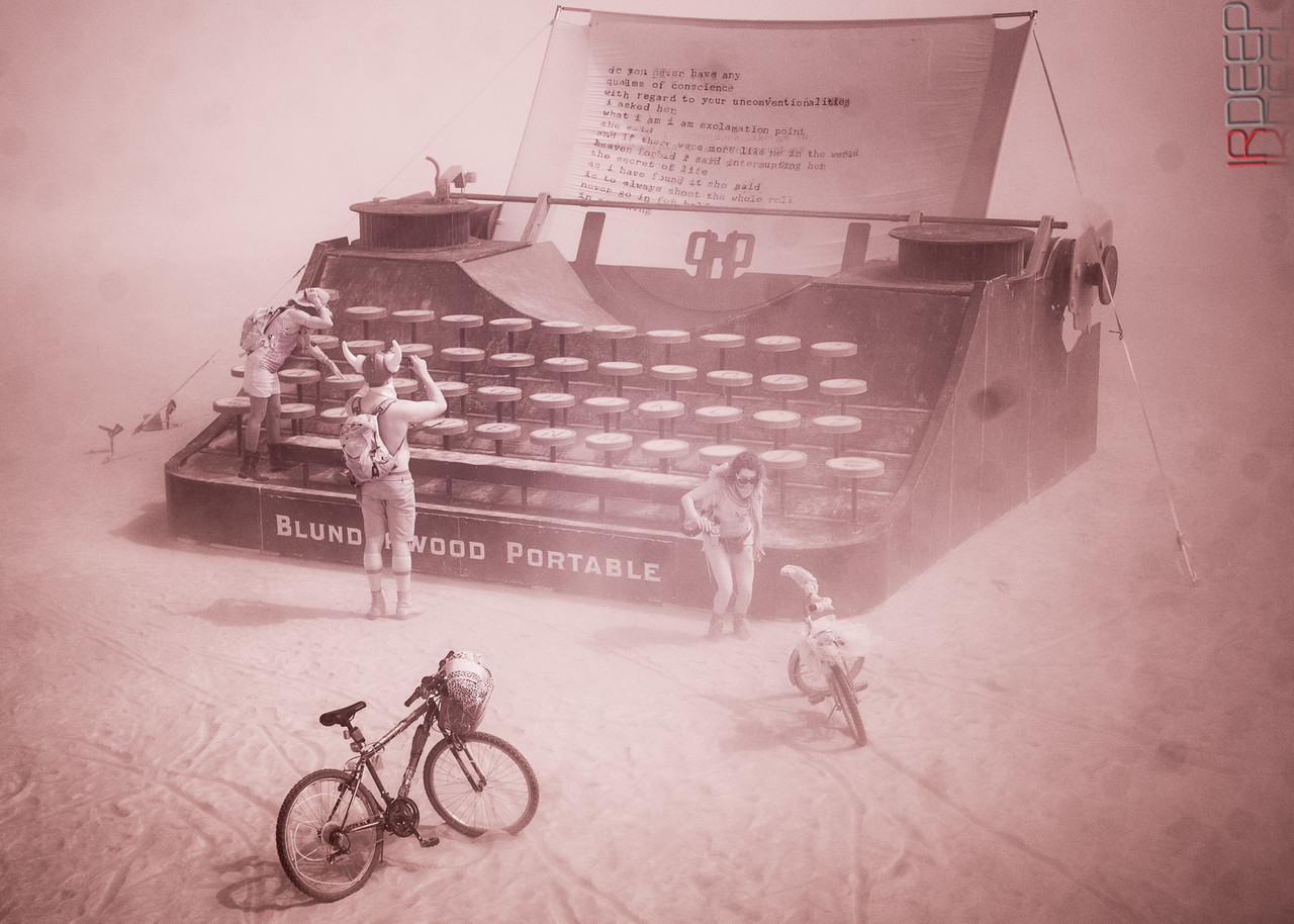 With funding from Burning Man, individual donations, and a successful Kickstarter campaign we built a giant 24:1 scale replica of a 1927 Underwood Portable typewriter. During the day, we displayed sections of a giant Archy and Mehitabel poem in the paper tray. At night, the paper was changed to a projection screen so that participants could type their own messages. The project was burned at the conclusion of Burning Man. Photo credit: IRDeep
