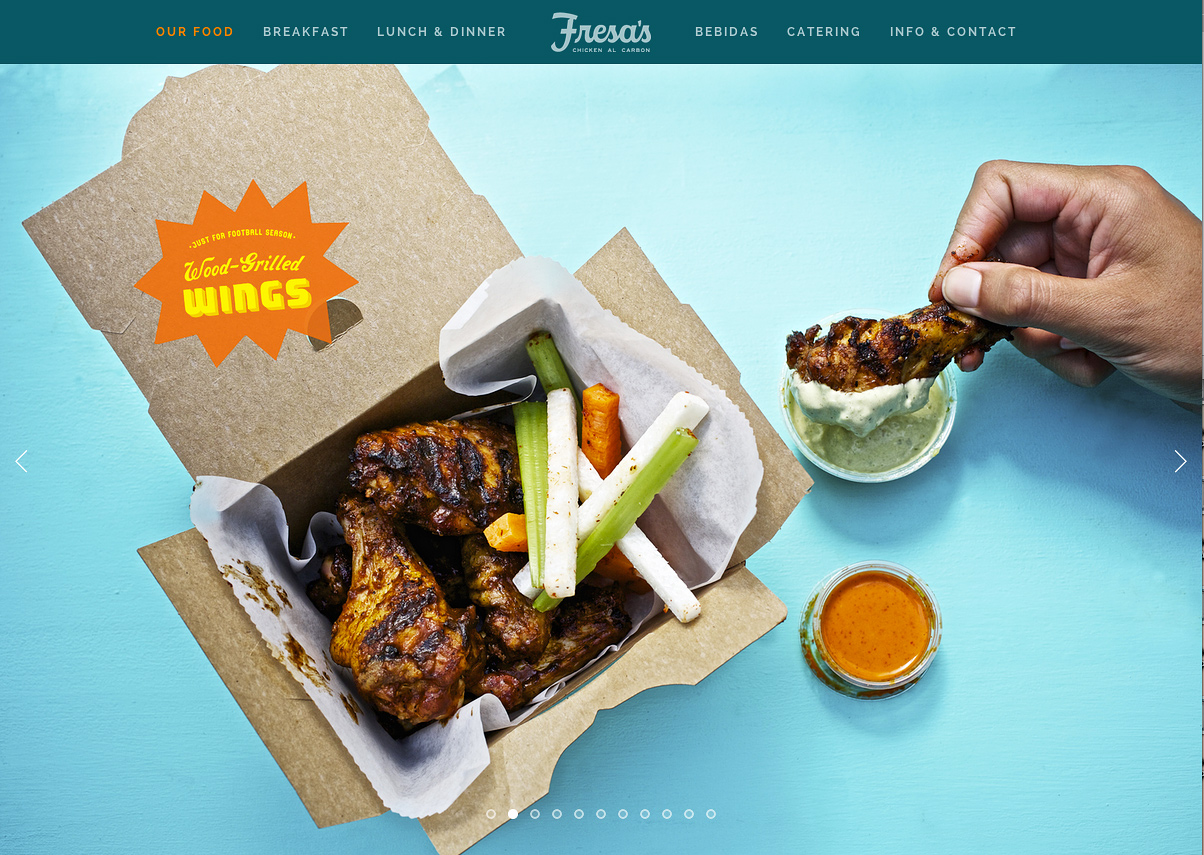 Chicken wing hand modeling for Fresa's Chicken al Carbon ; Photography by Jody Horton .
