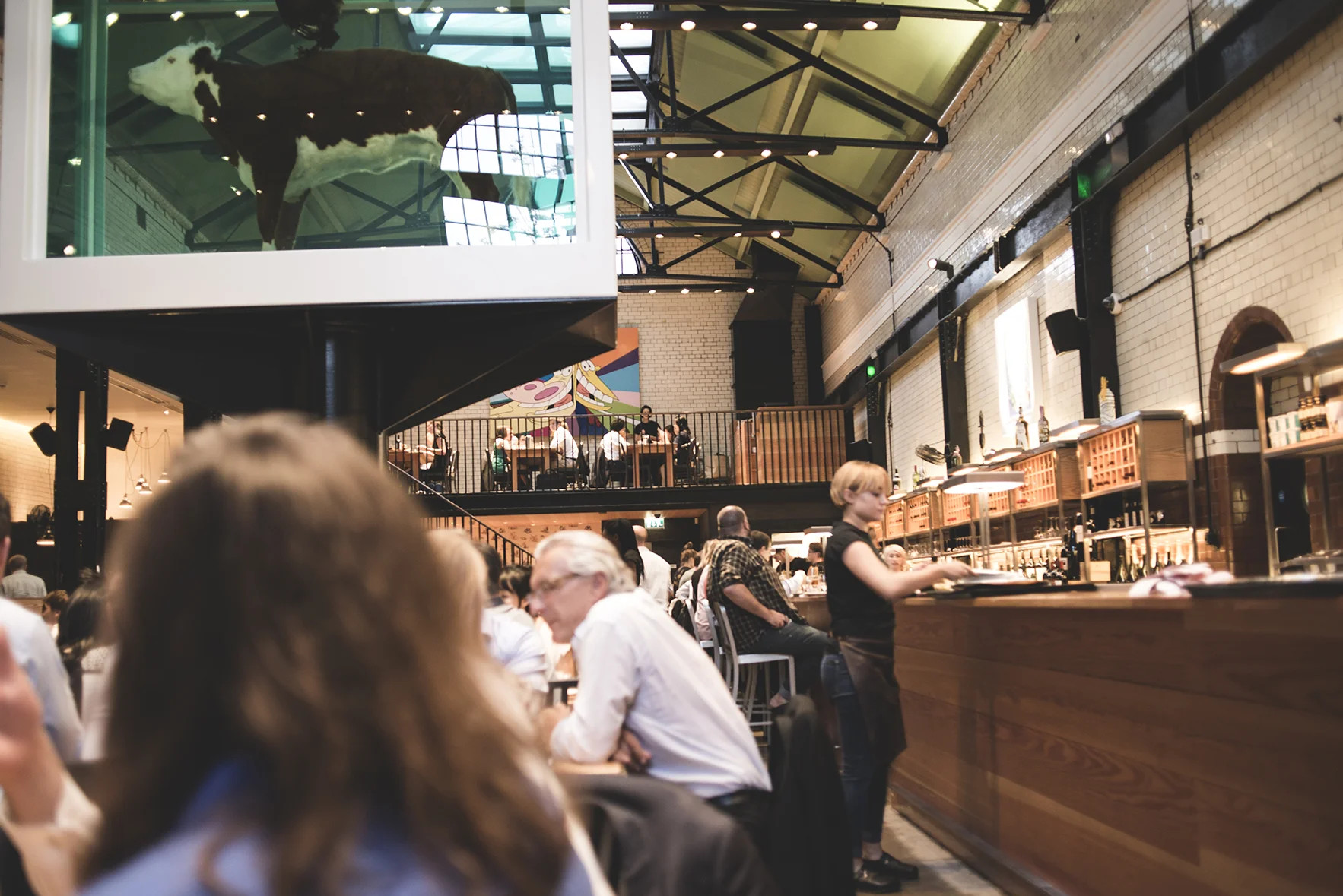 A view of Damien Hirst's piece and a bar, available for walk-ins and those in need of a drink! 