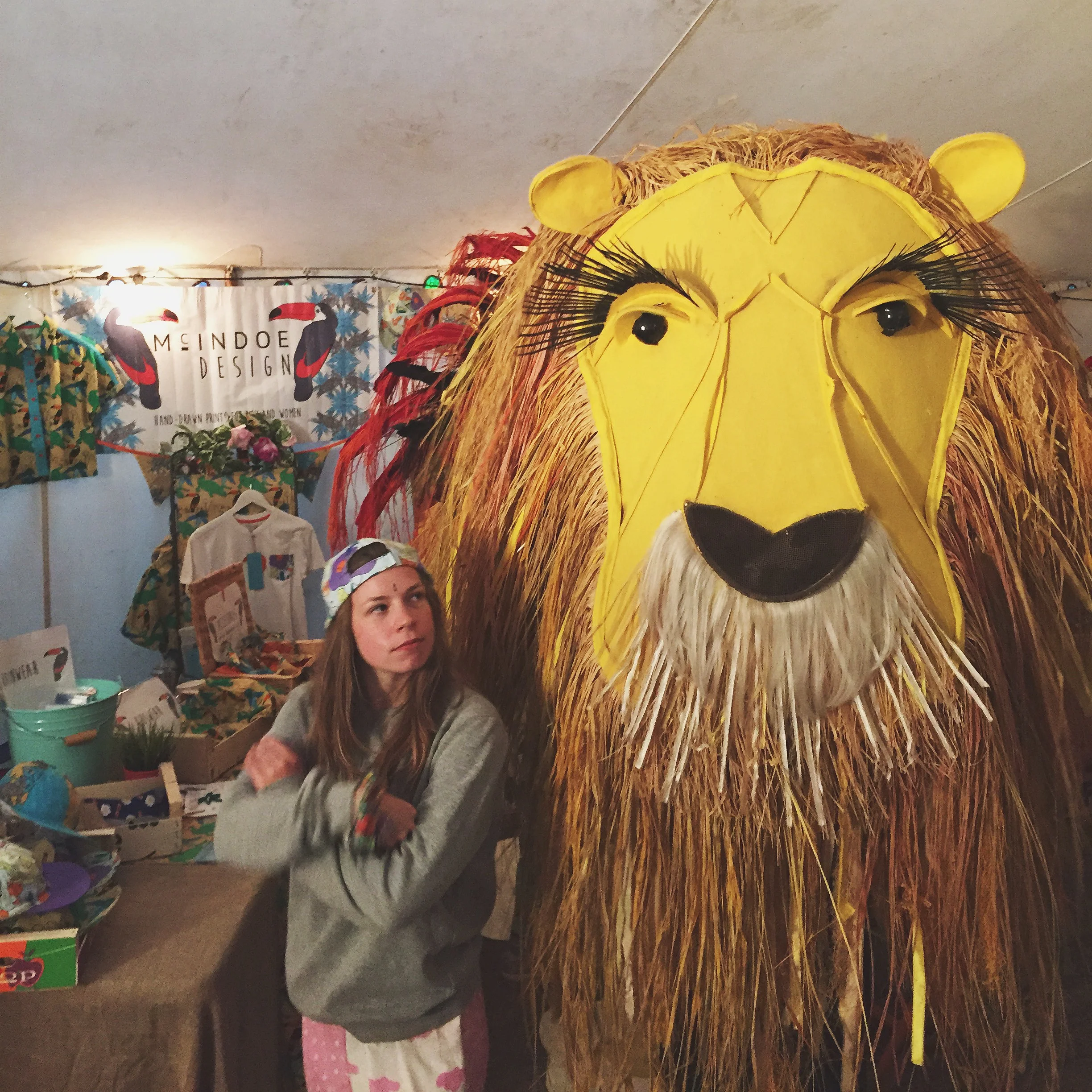 A lion we found at the festival looking for an equally large rooster 
